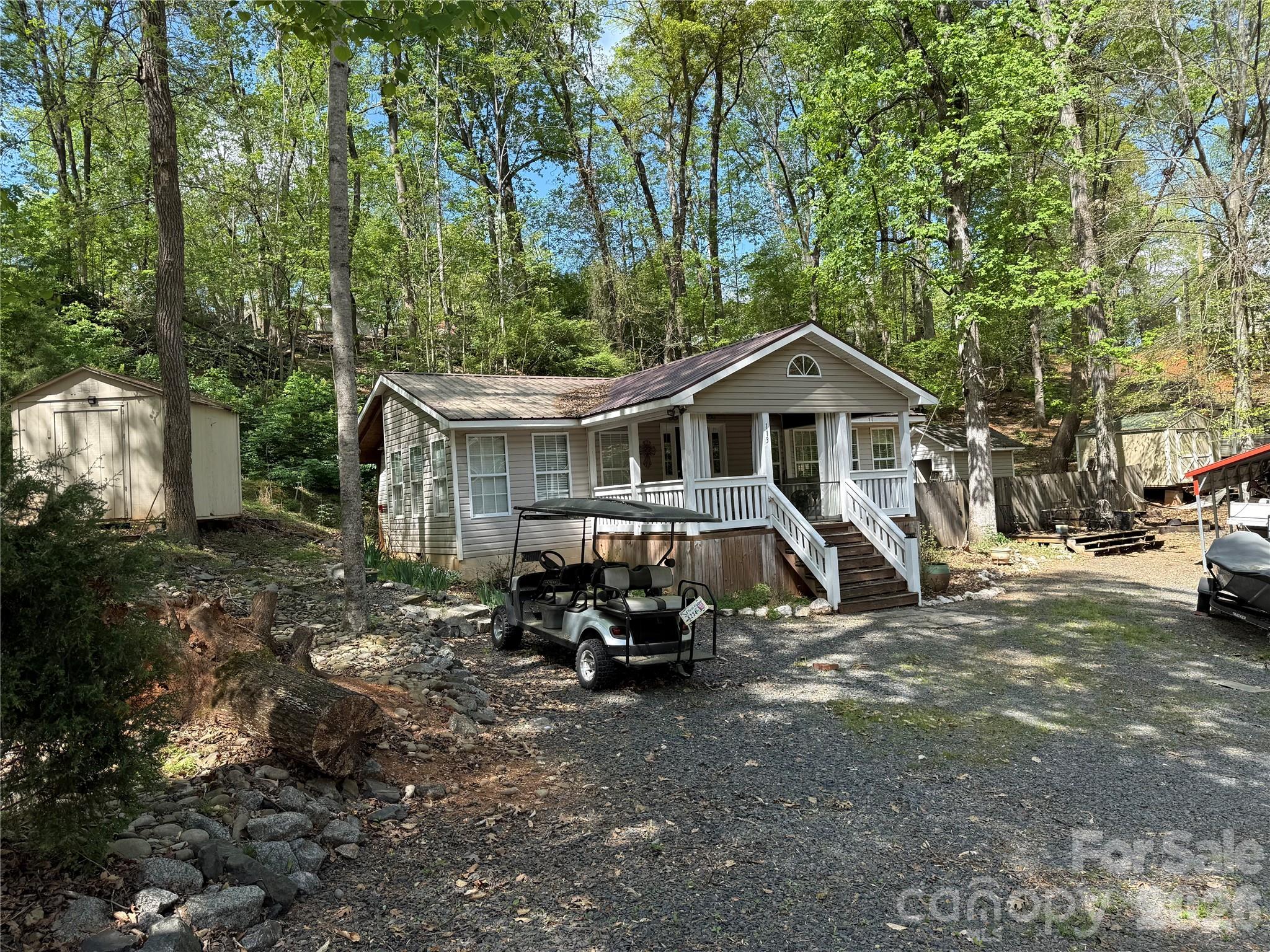 Single Family Residence at 113/115 Indian Harbor Circle, Mount Gilead, photo 2 of 37