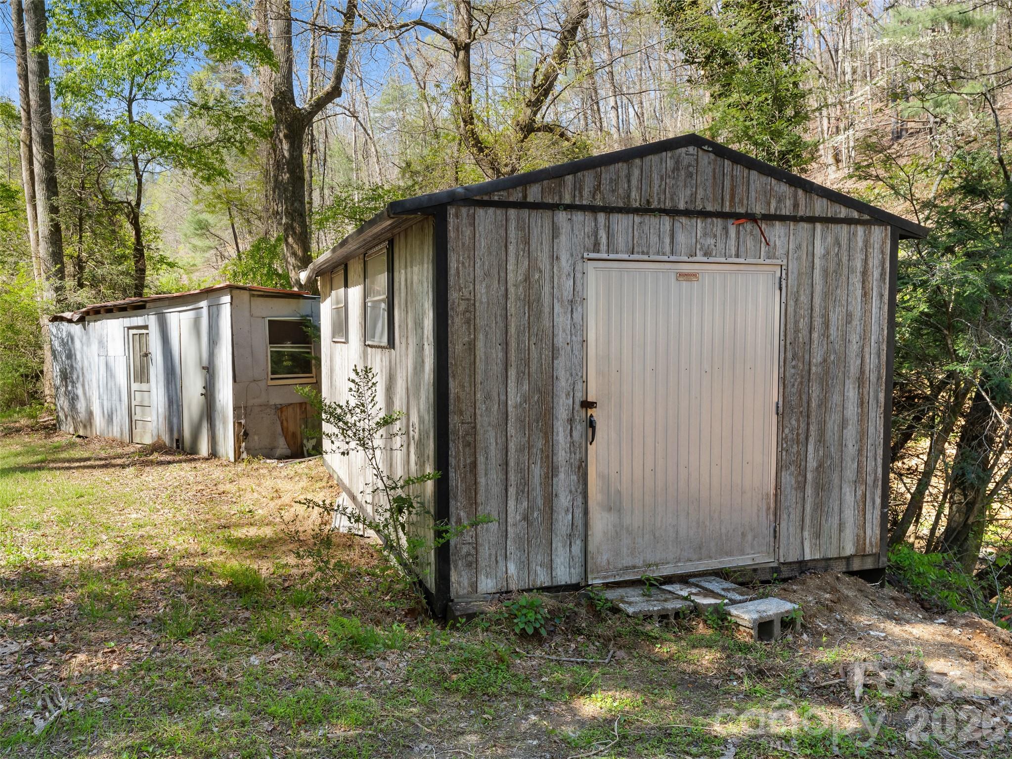 Sheds are on property. Need to be removed or fixed at buyers discretion. - 40 Morning Dove Lane, Flat Rock