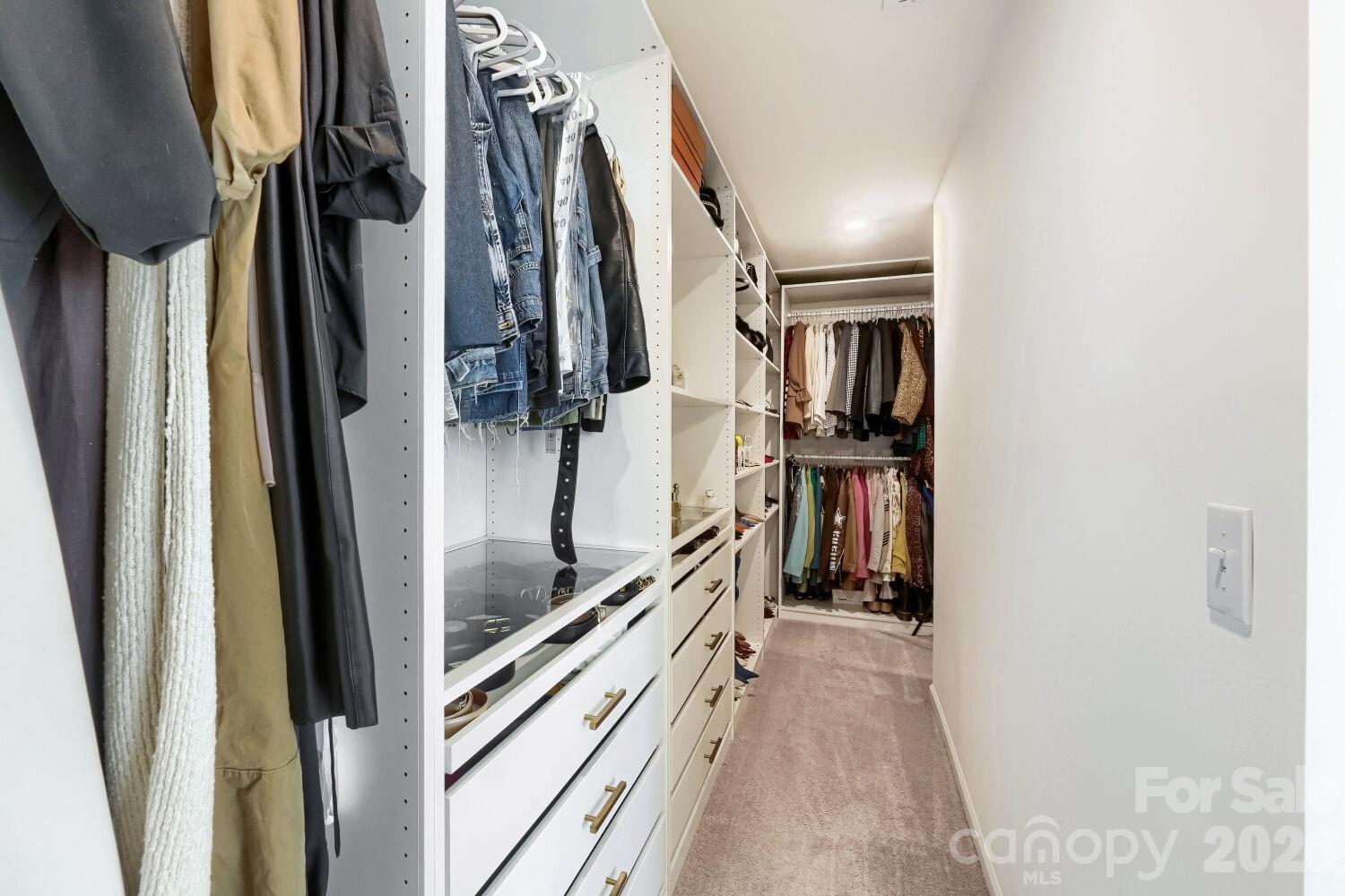 Custom cabinets in primary closet - 7004 Duncan Acres Drive, Belmont