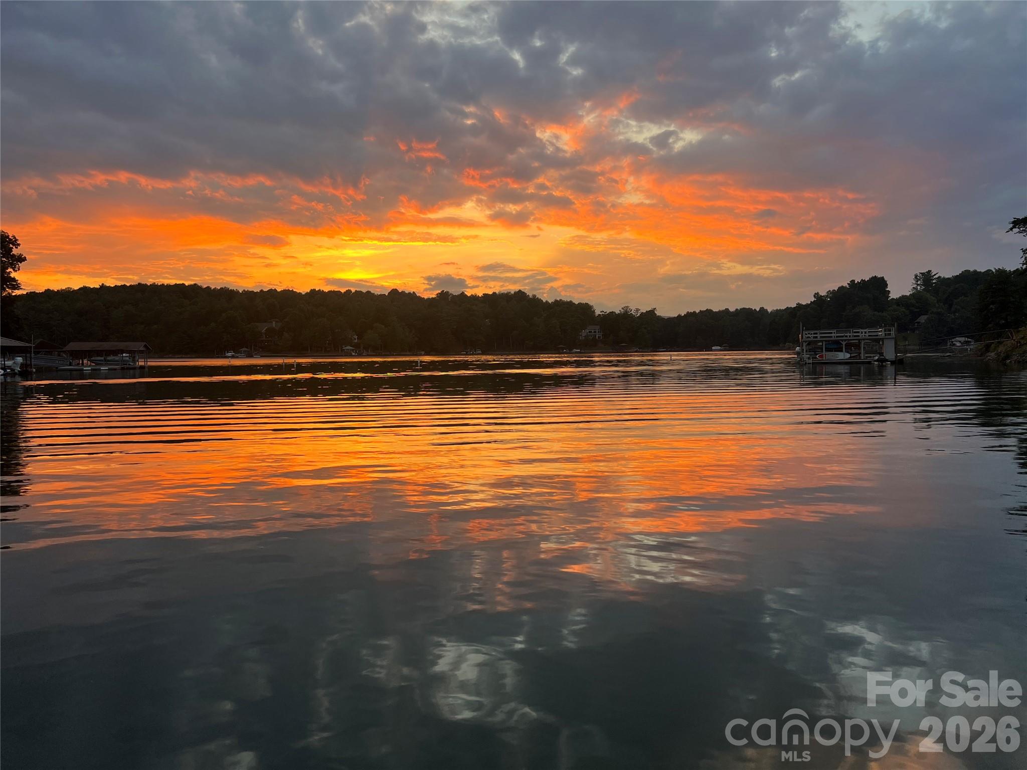 sunset photo taken by seller at the dock - 1600 Lillians Point Court, Morganton