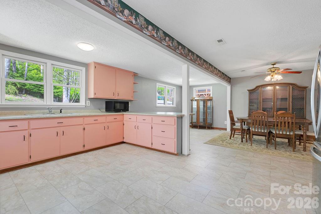 Open Kitchen and Dining Area - 1482 Island Ford Road, Brevard