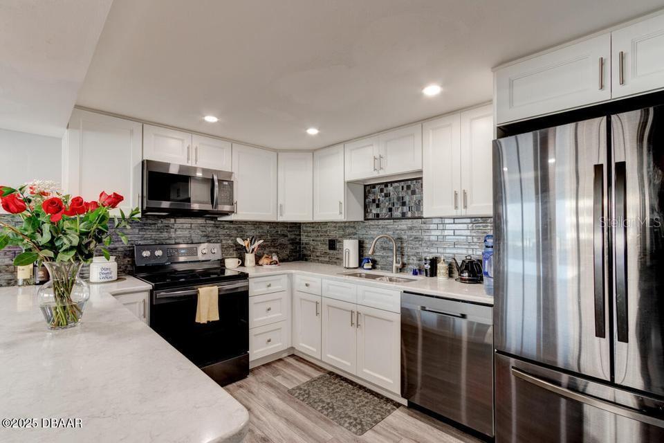 Kitchen - 2828 N ATLANTIC AVE #303, DAYTONA BEACH