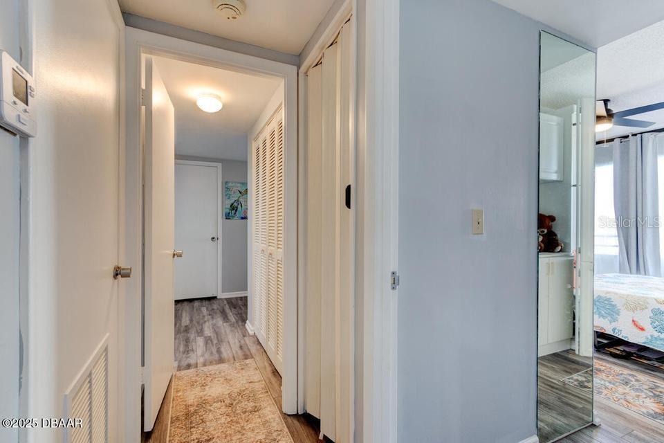 Hallway to Primary Suite - 2828 N ATLANTIC AVE #303, DAYTONA BEACH
