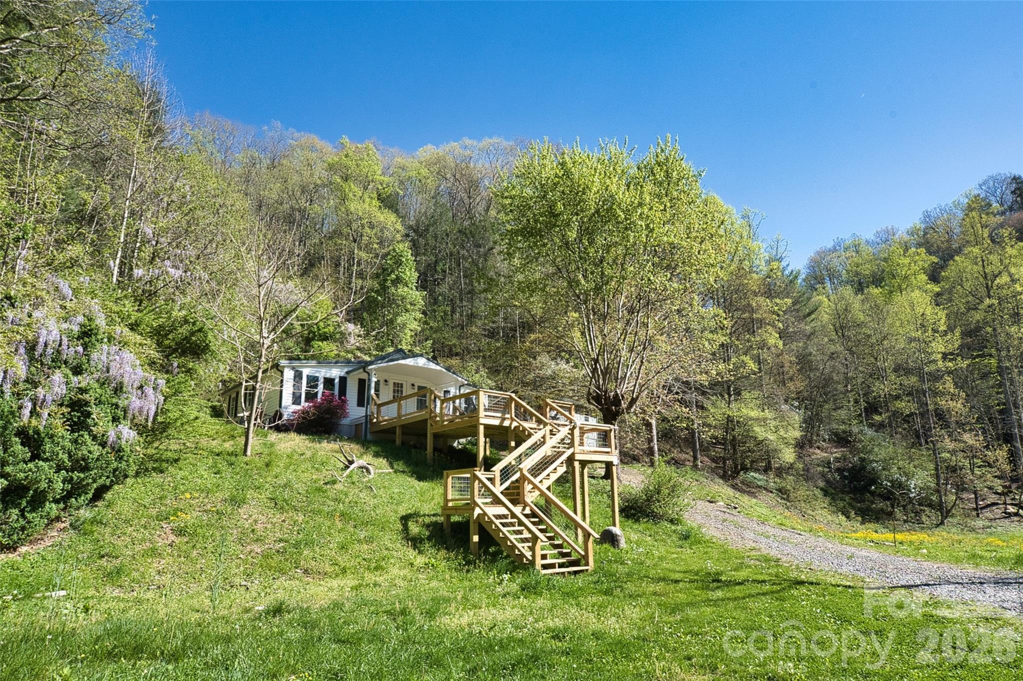 Another angle on the farmhouse and new deck - 2180 Pigeon Roost Road, Green Mountain