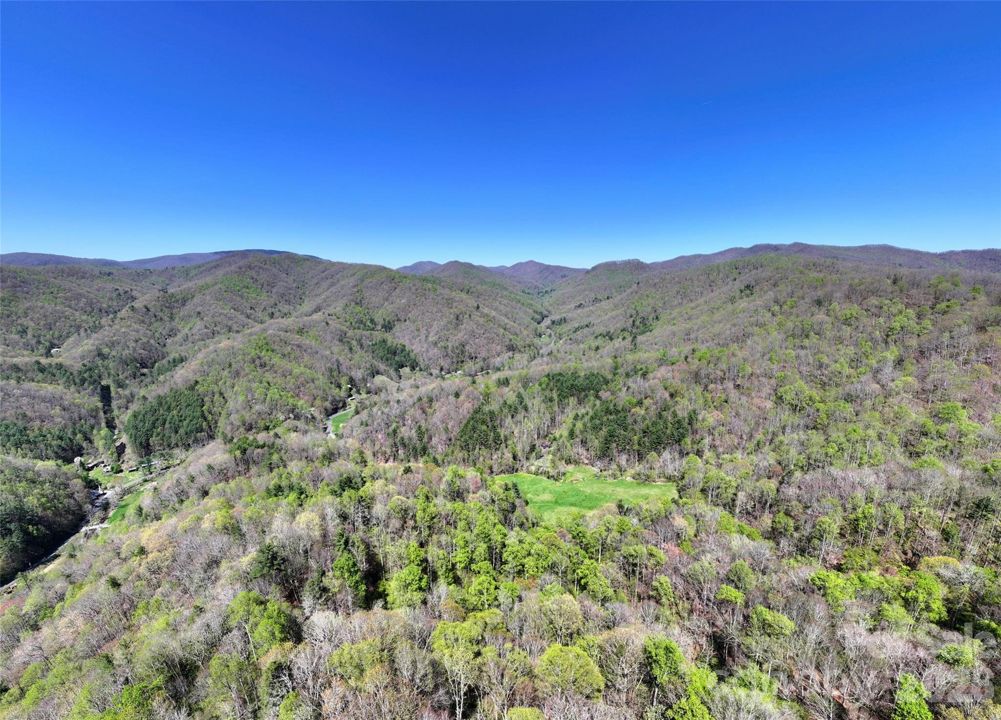 One ridge has a nice flat top -- would you put a gazebo or firepit up here? - 2180 Pigeon Roost Road, Green Mountain