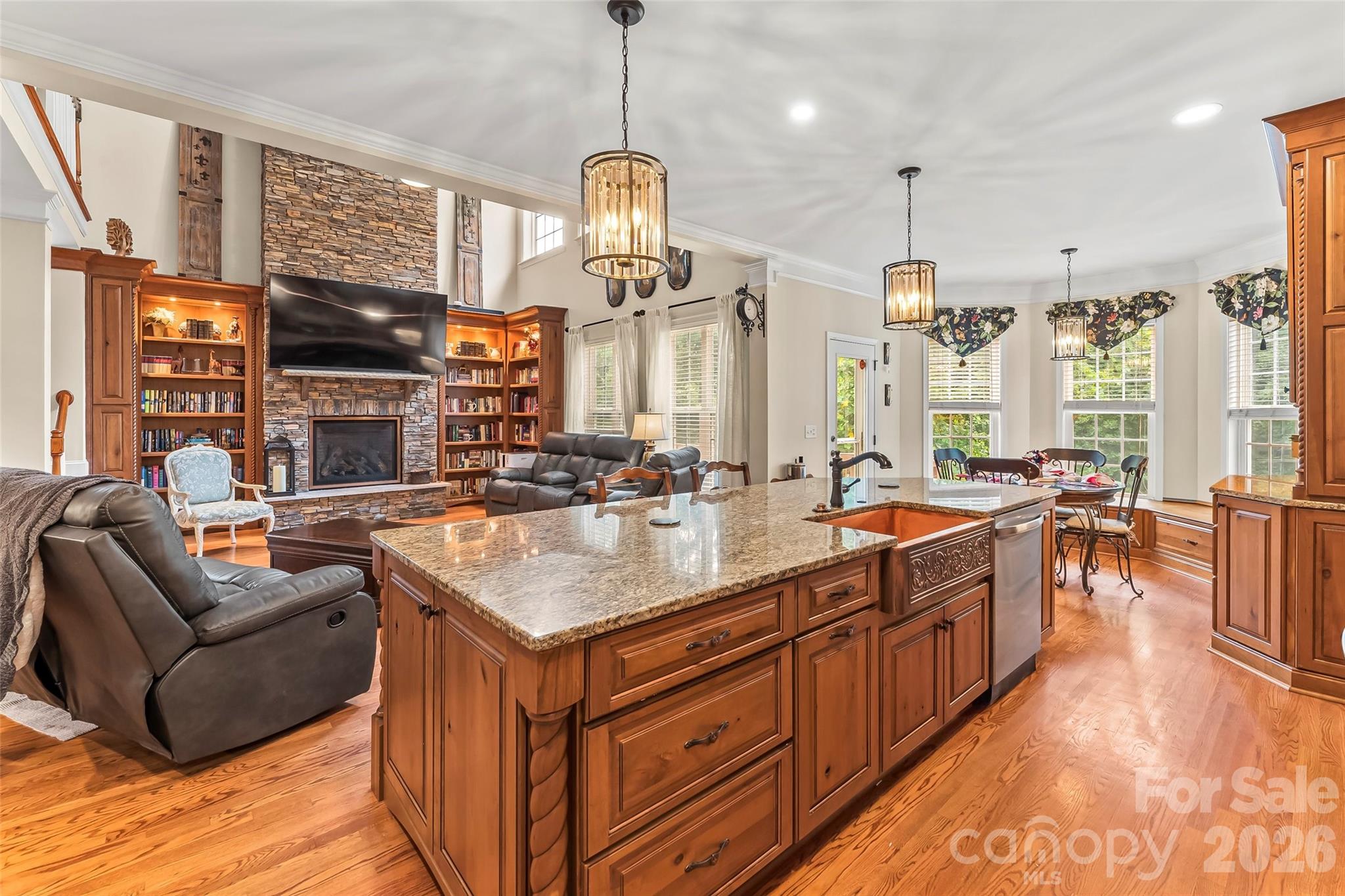 Timeless wood cabinetry, custom details throughout and a tree-lined backyard view out every window! - 120 Harrison Point Court, Mooresville