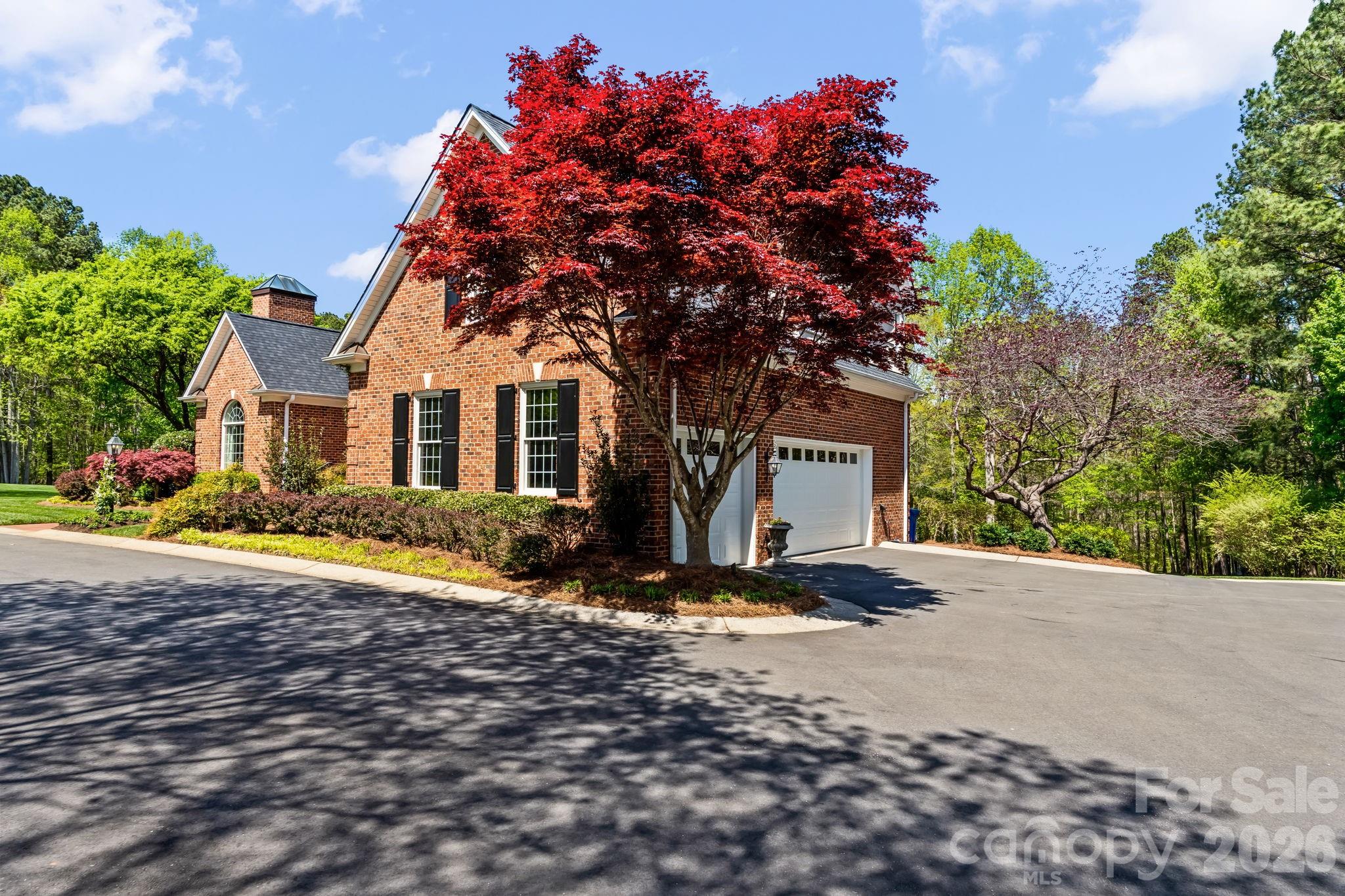 Recently paved circle drive to heated 3 car garage - 11555 Double Spring Road, Lewisville