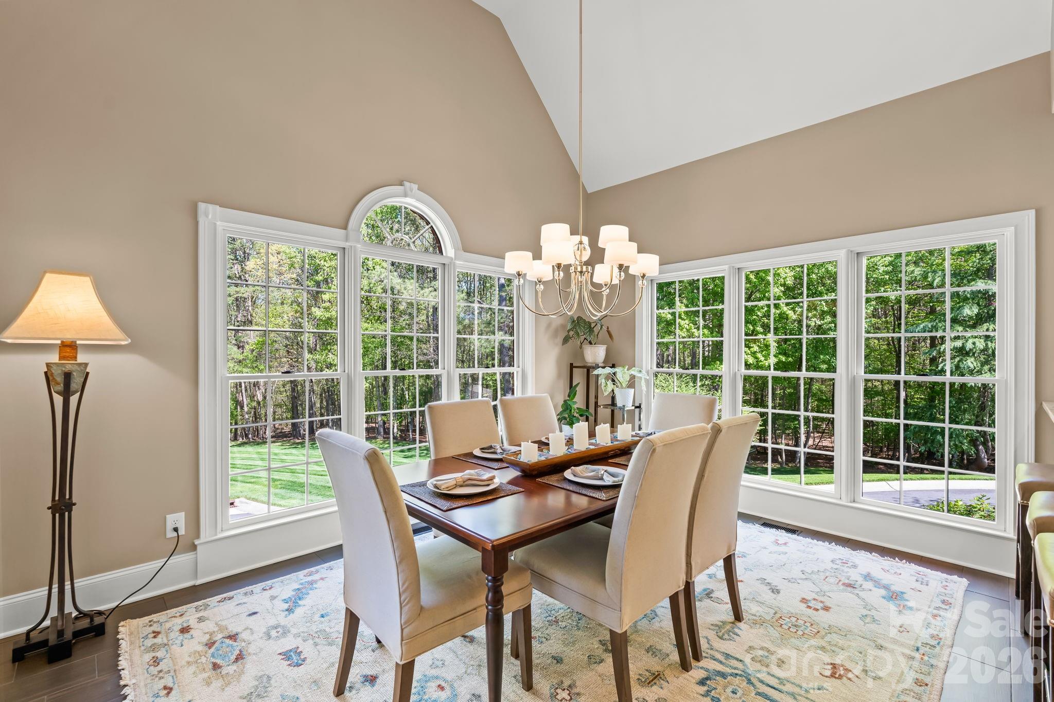 Eat in kitchen with beautiful lighting from the oversized windows - 11555 Double Spring Road, Lewisville