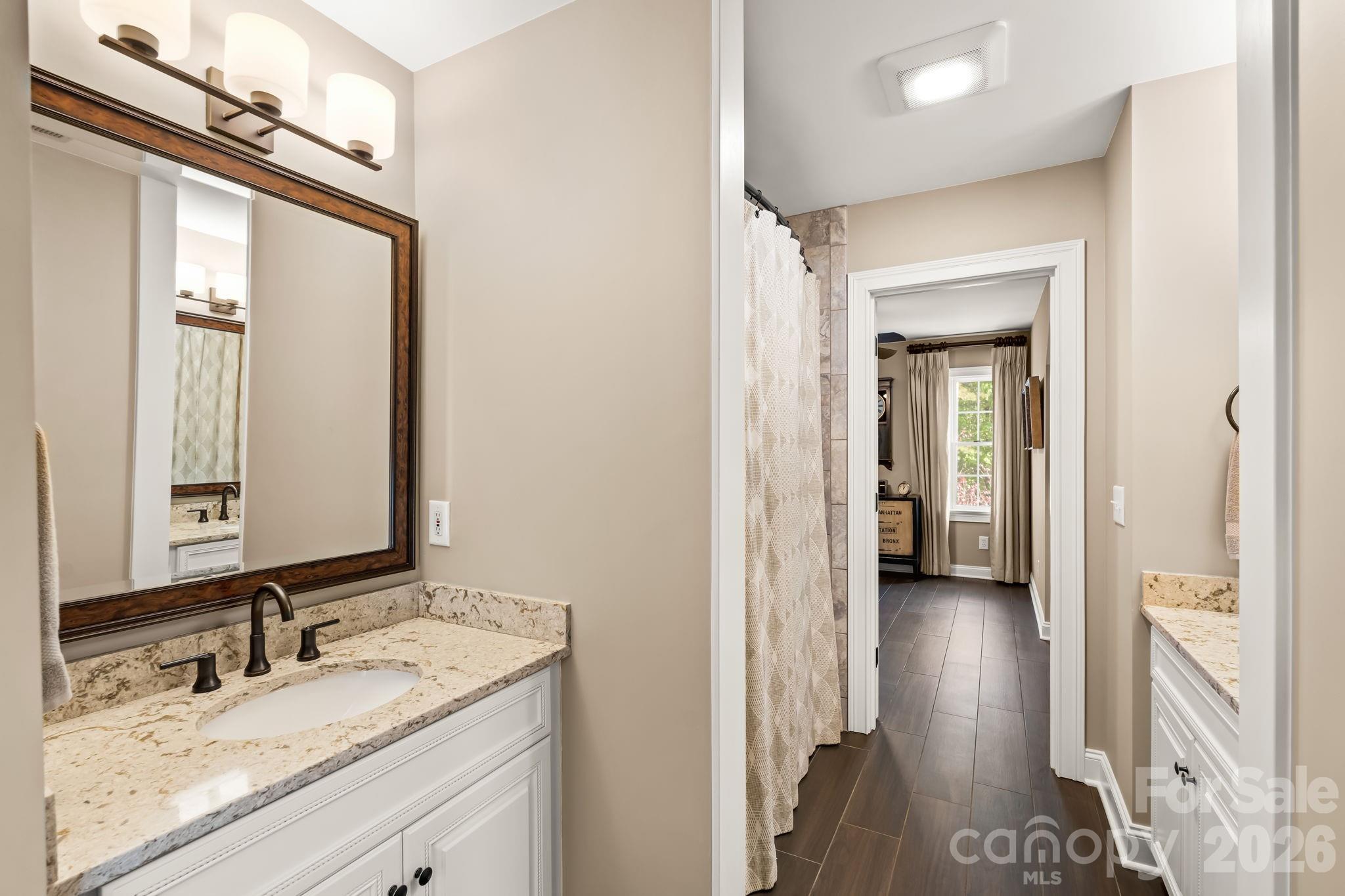 This Jack and Jill bathroom caters to the 4th bedroom and the bonus room - 11555 Double Spring Road, Lewisville