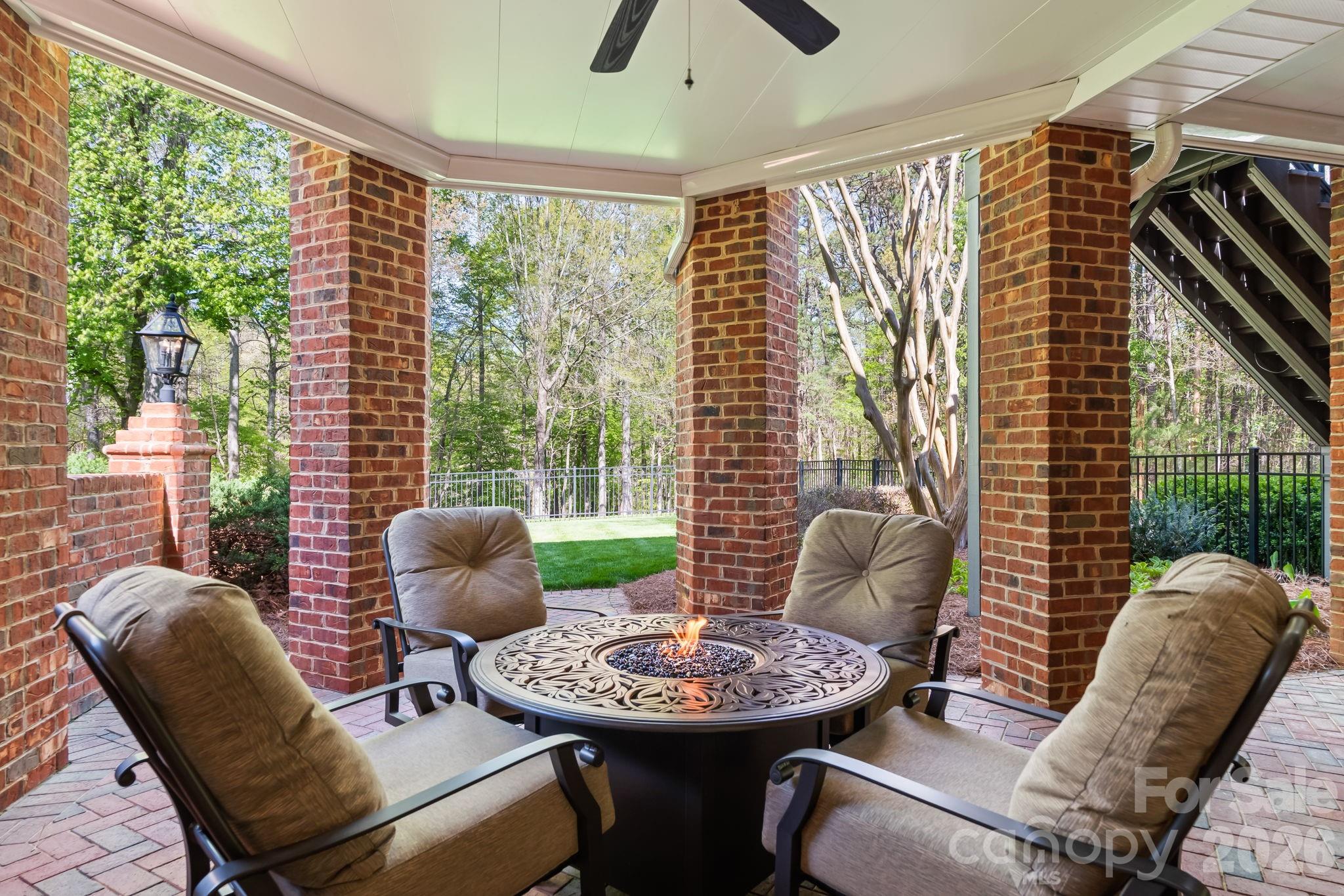 Lower level patio with extensive lighting - 11555 Double Spring Road, Lewisville