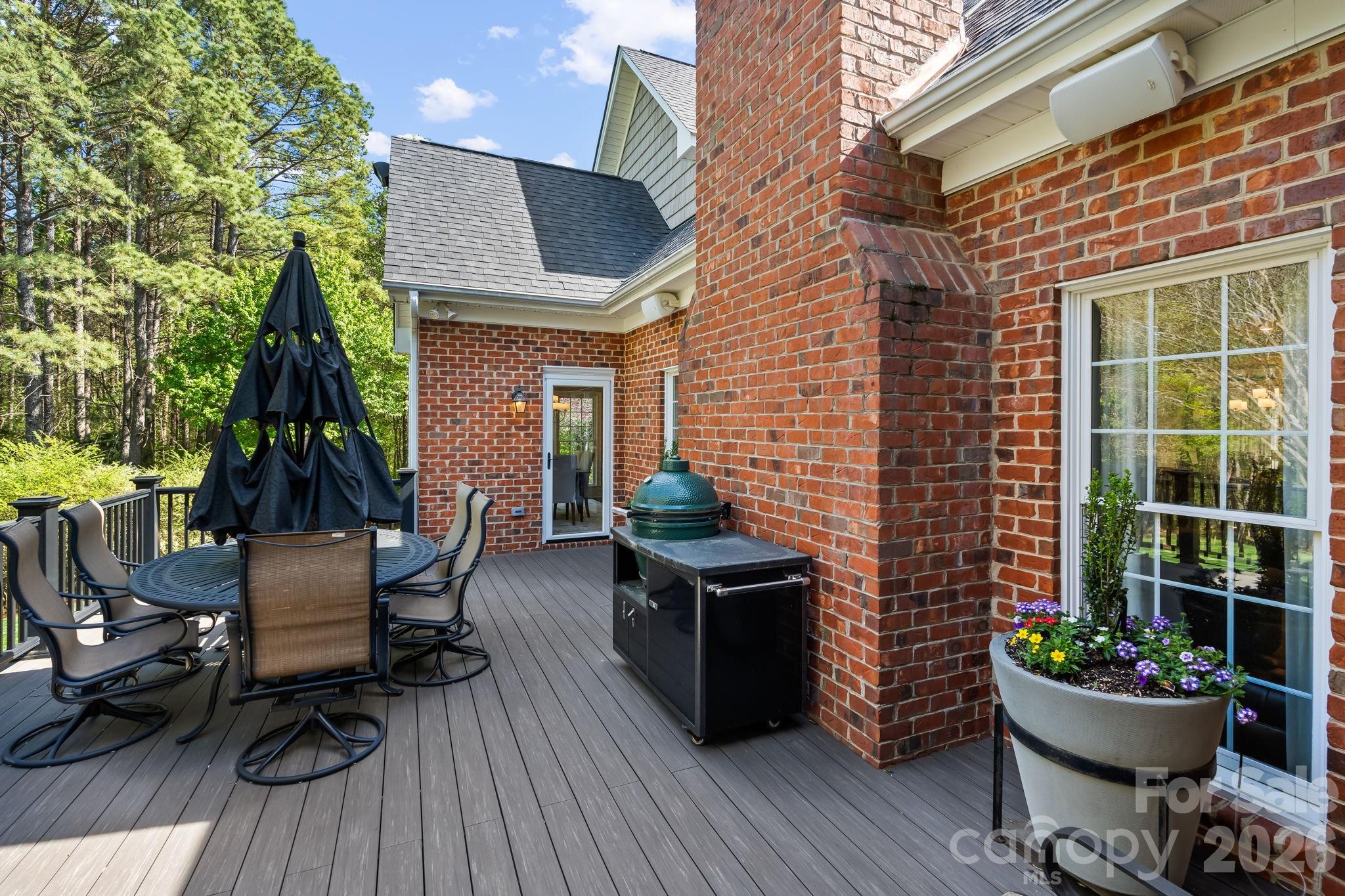 The deck features Azek composite materials for the lighted floors and railings. - 11555 Double Spring Road, Lewisville
