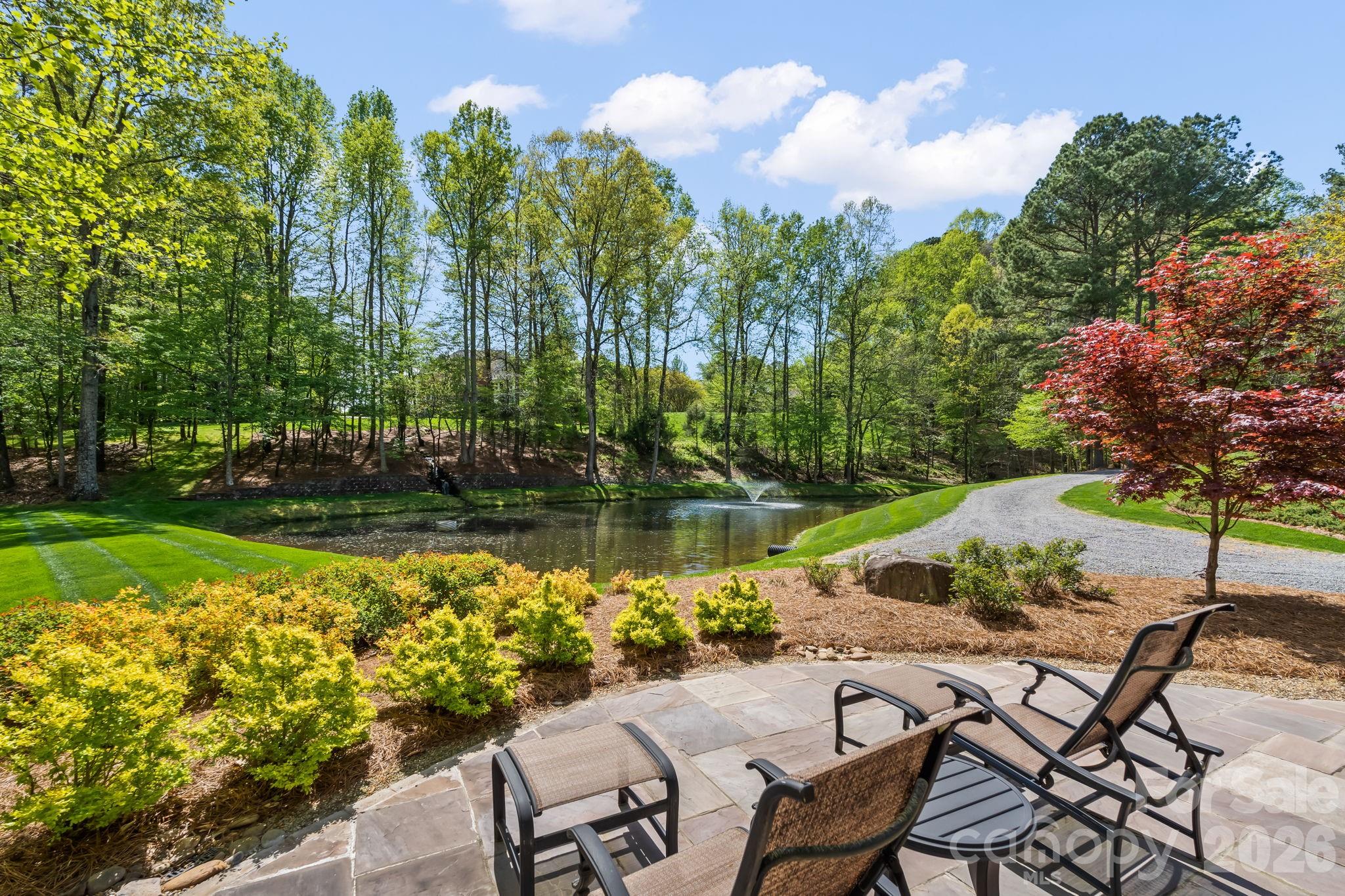 Enjoy gorgeous views of the property with water features and outdoor speakers - 11555 Double Spring Road, Lewisville