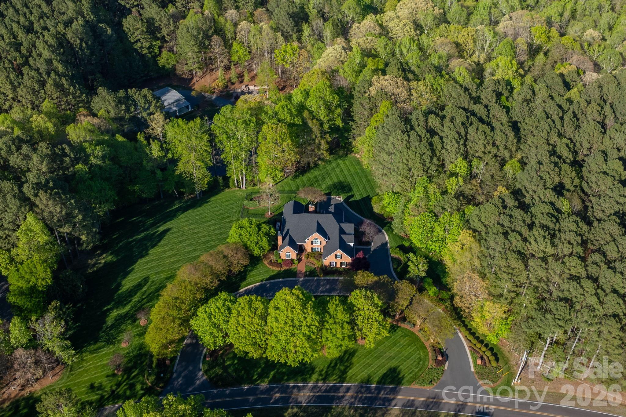 Privacy, beauty, and room to play, this well loved estate is Impeccable - 11555 Double Spring Road, Lewisville