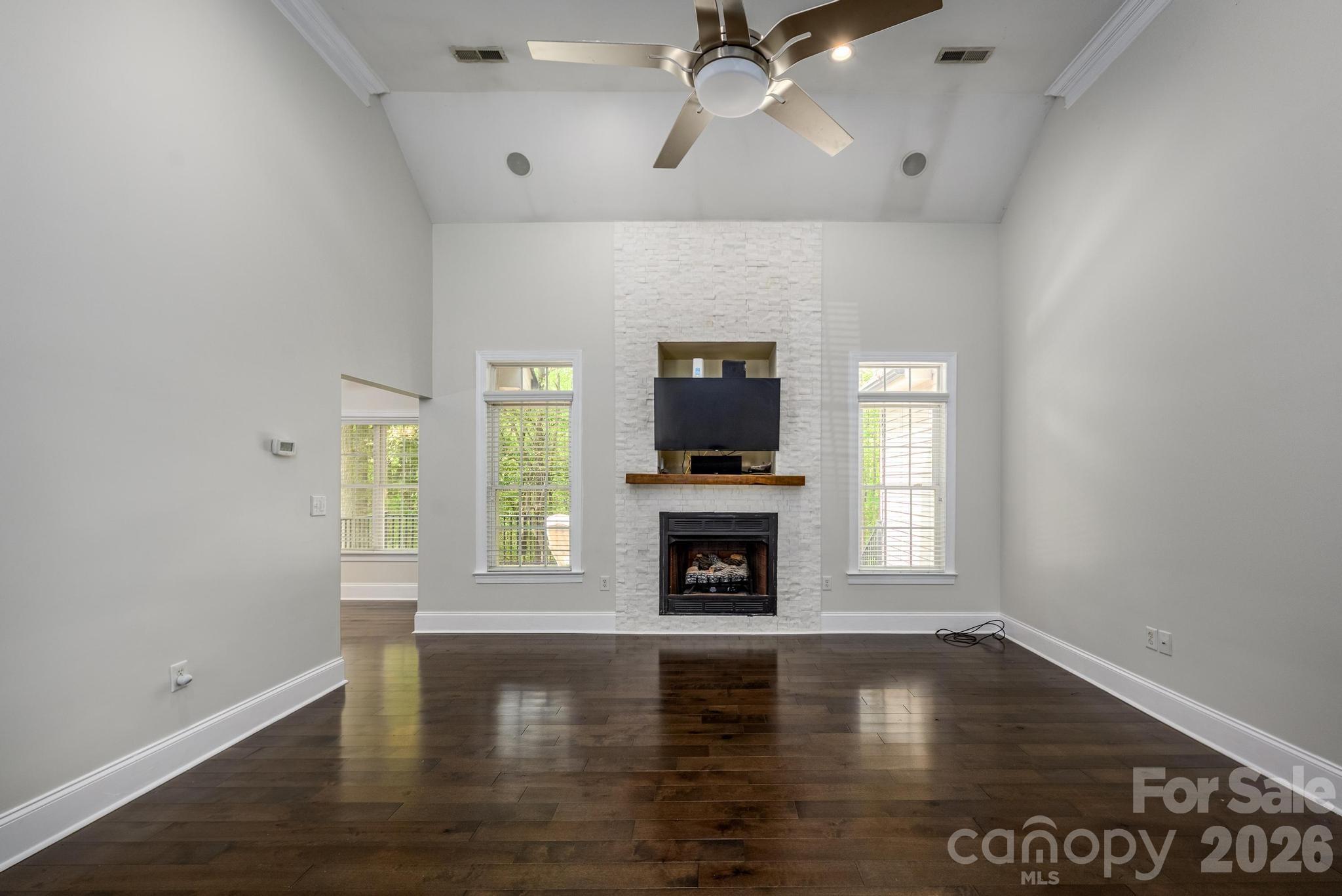 Great Room w/Stacked Stone Fireplace - 7867 Golf Course Drive N, Denver