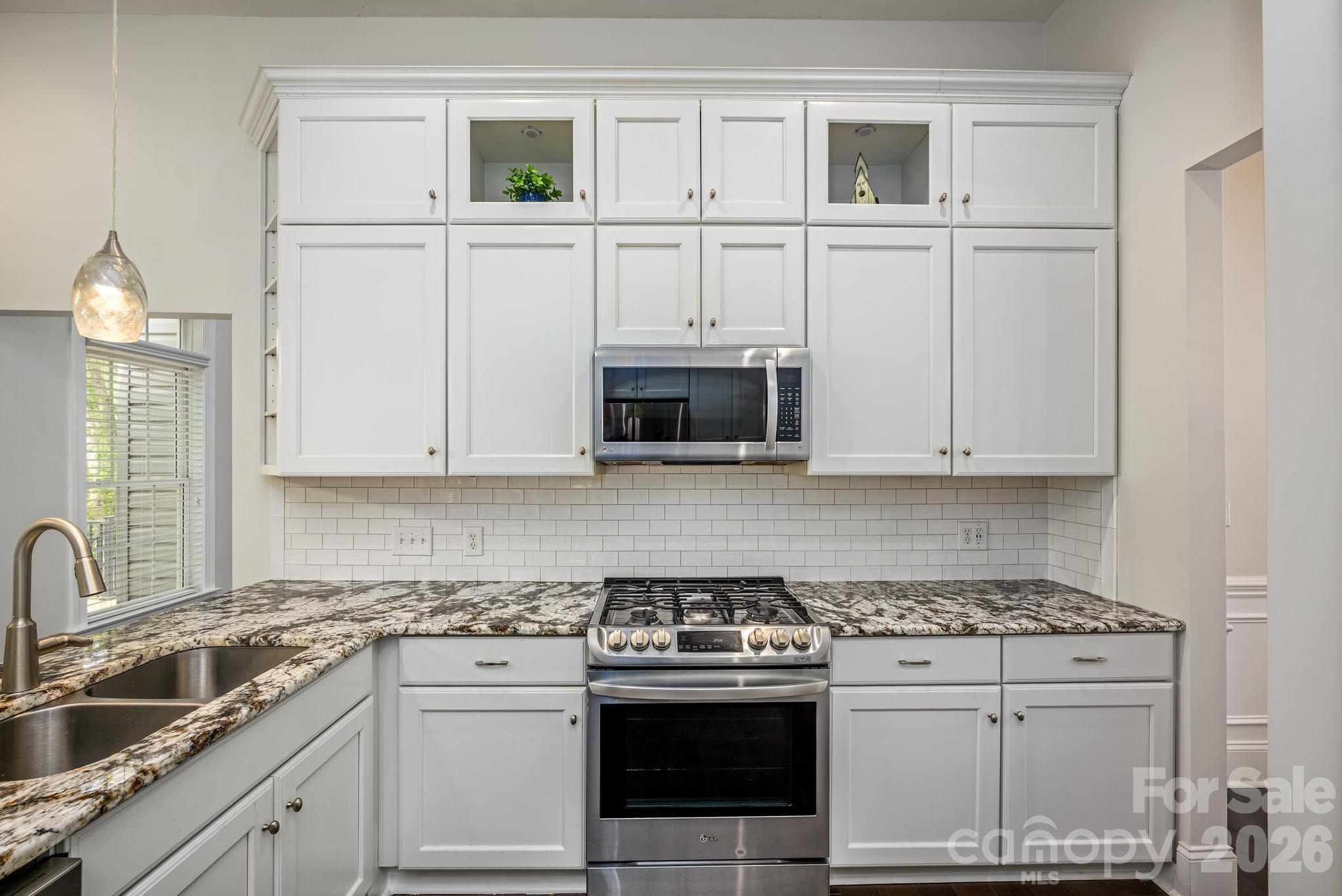 Gourmet Kitchen w/Gas Stove - 7867 Golf Course Drive N, Denver