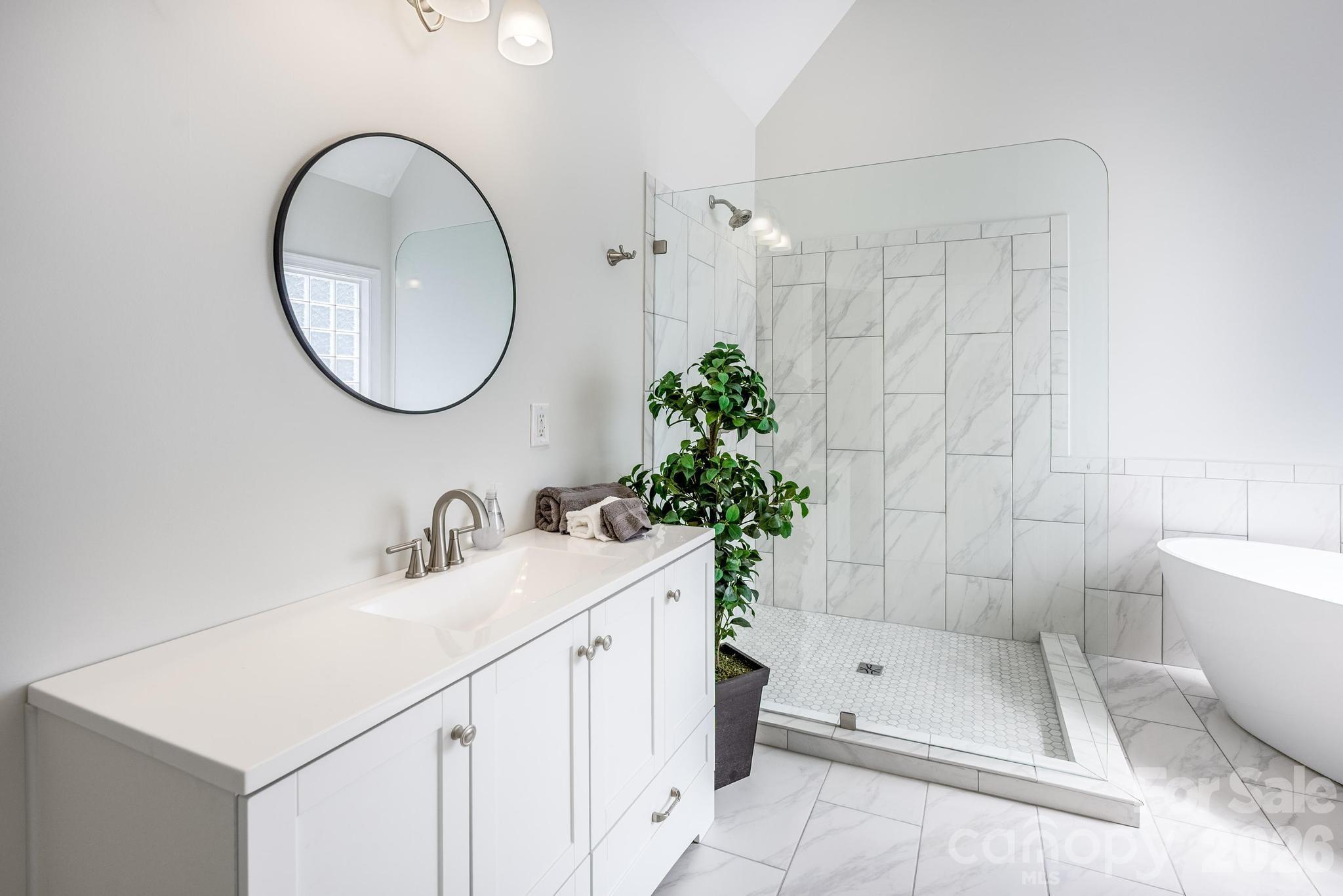 Primary Bath w/Doorless Walk-In Shower - 7867 Golf Course Drive N, Denver