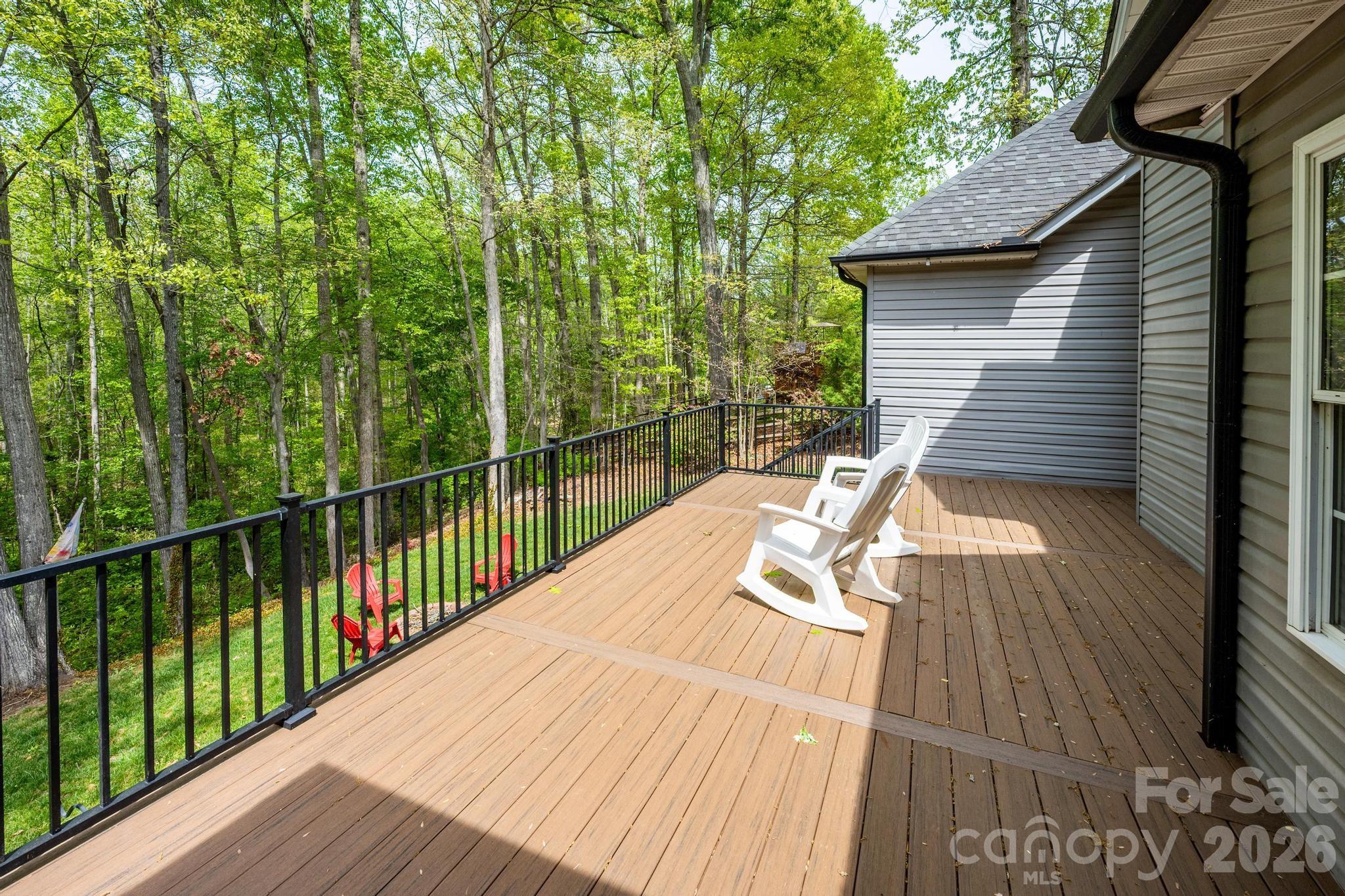 Newly Expanded Deck Overlooking Private Backyard - 7867 Golf Course Drive N, Denver