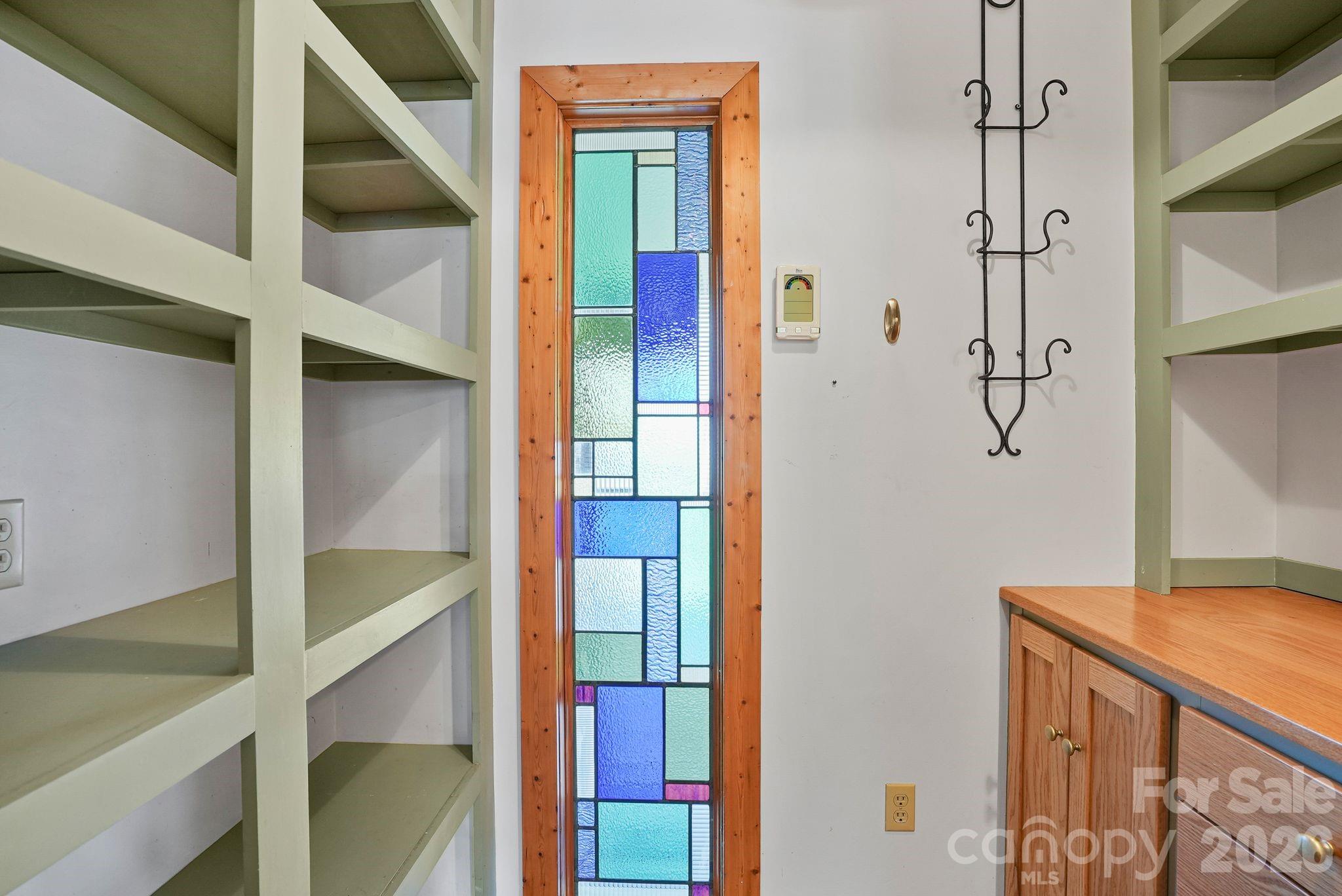 Butler's pantry w/so much additional storage and custom stained glass - 310 Burr Ridge, Marshall