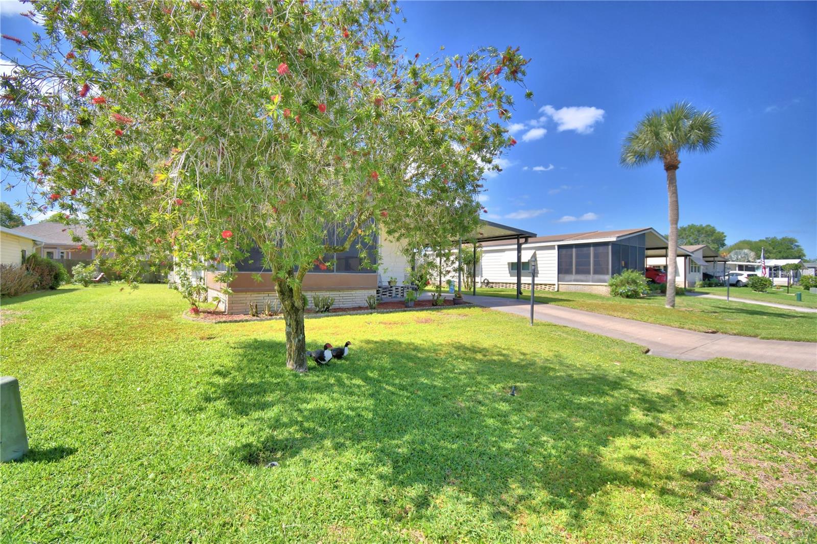 Manufactured Home at 447 VILLAGE CIR SW, WINTER HAVEN, photo 2 of 48