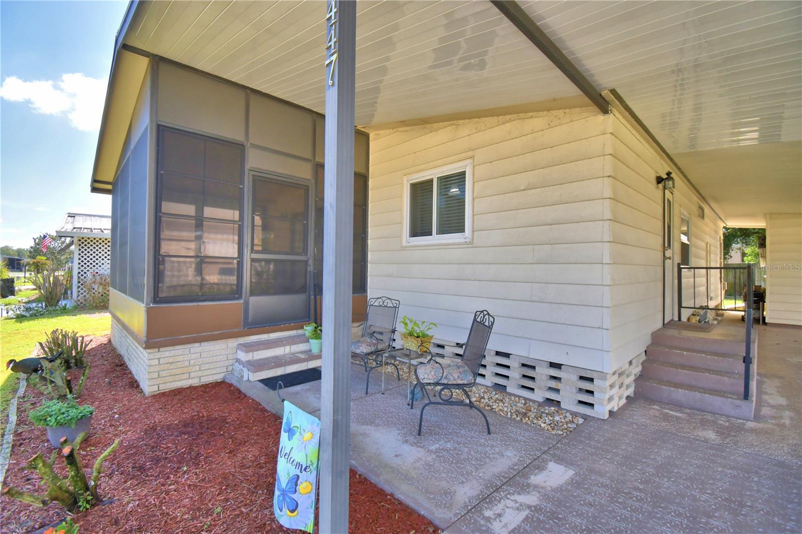 Manufactured Home at 447 VILLAGE CIR SW, WINTER HAVEN, photo 4 of 48