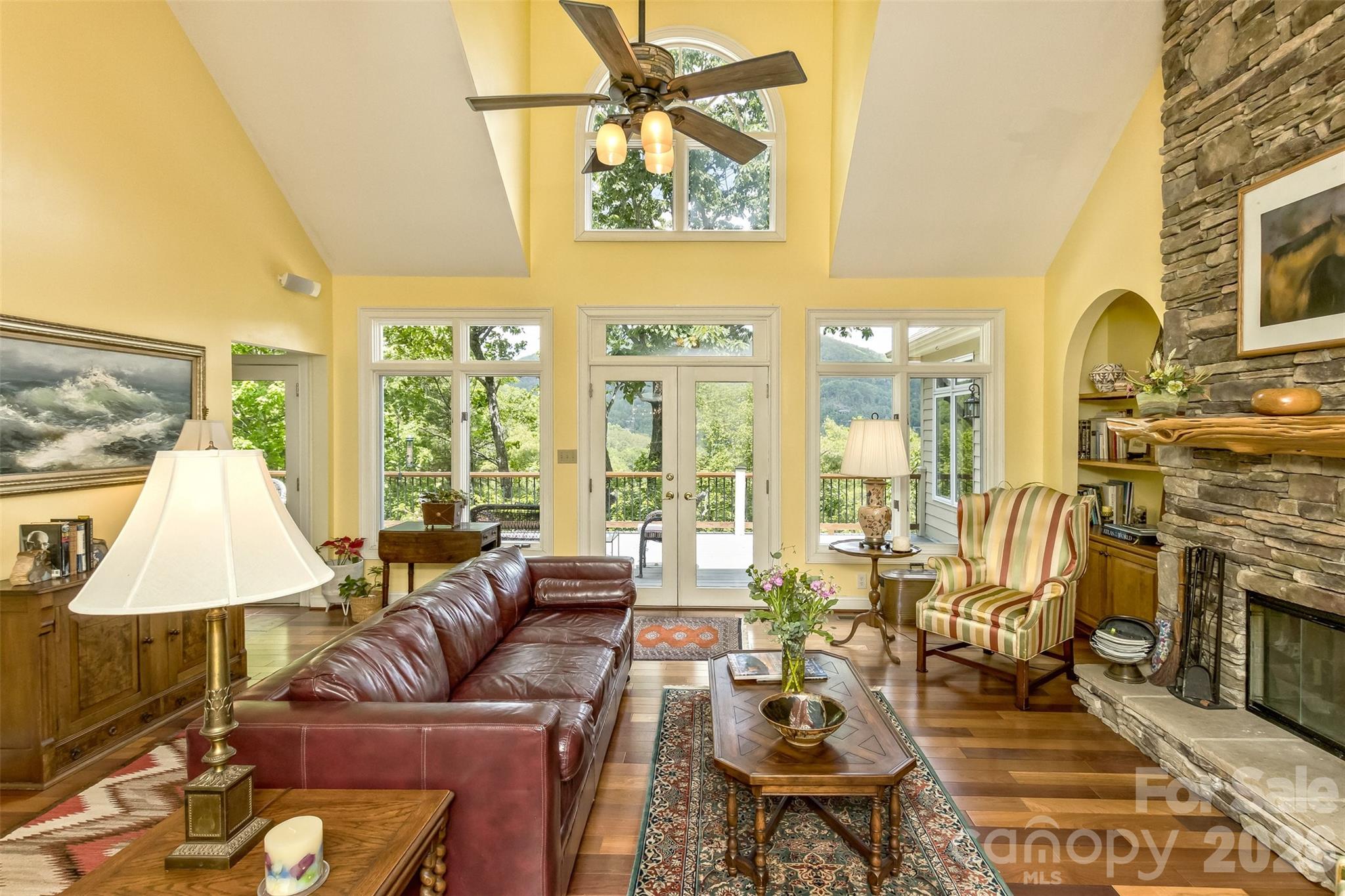 Large Open Living Room with entrance to deck and Views - Wood Burning Fireplace - 25 Windsong Drive, Fairview
