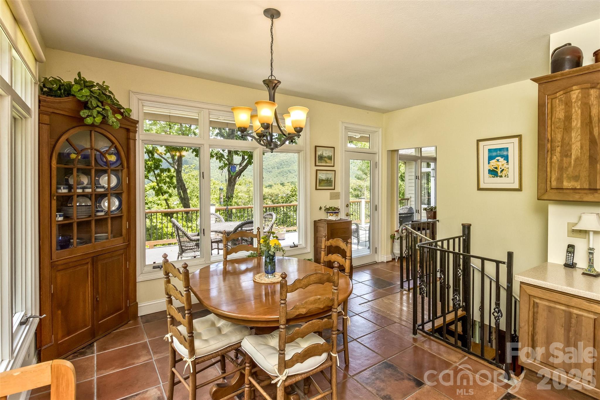Breakfast nook also houses the spiral staircase to lower level guest area and garages. - 25 Windsong Drive, Fairview