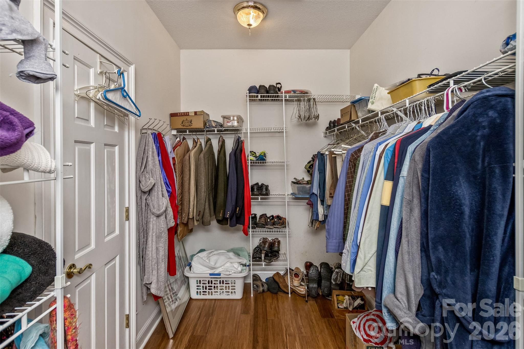One of two closets adjacent to the primary suite - 25 Windsong Drive, Fairview