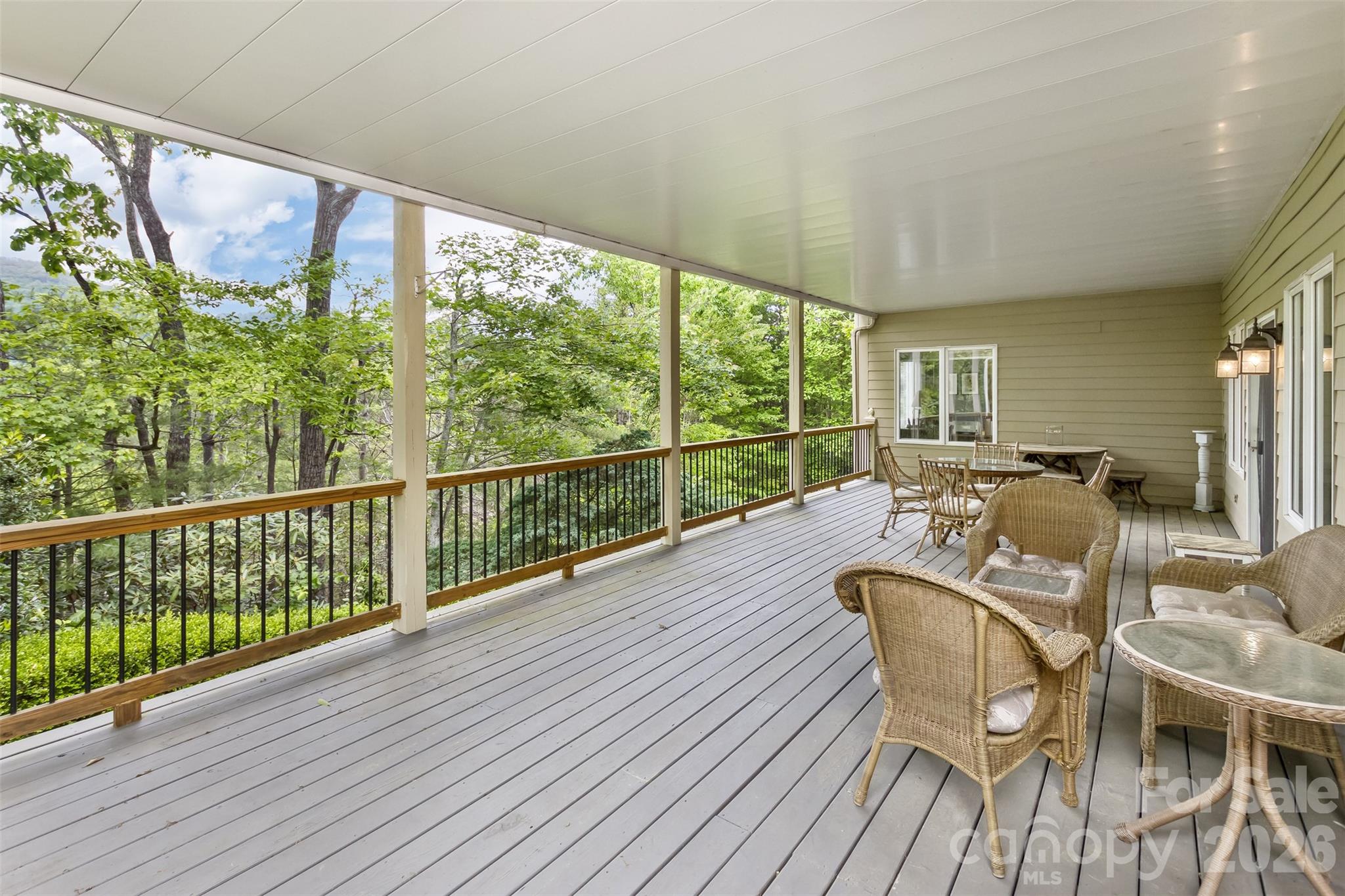 Lower Level Deck is covered and nestled in nature - 25 Windsong Drive, Fairview