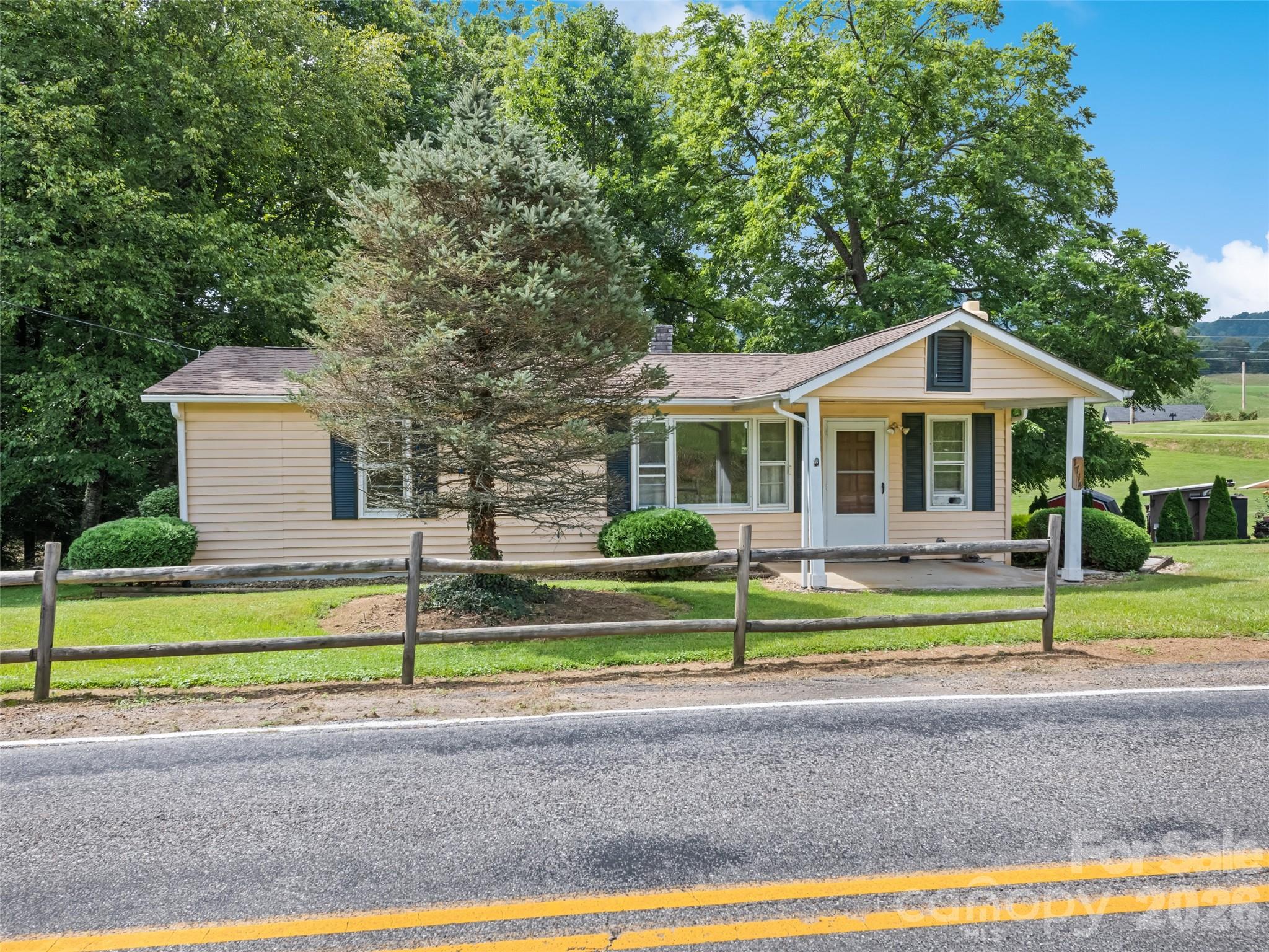 Single Family Residence at 1714 Iron Duff Road, Waynesville, photo 2 of 25