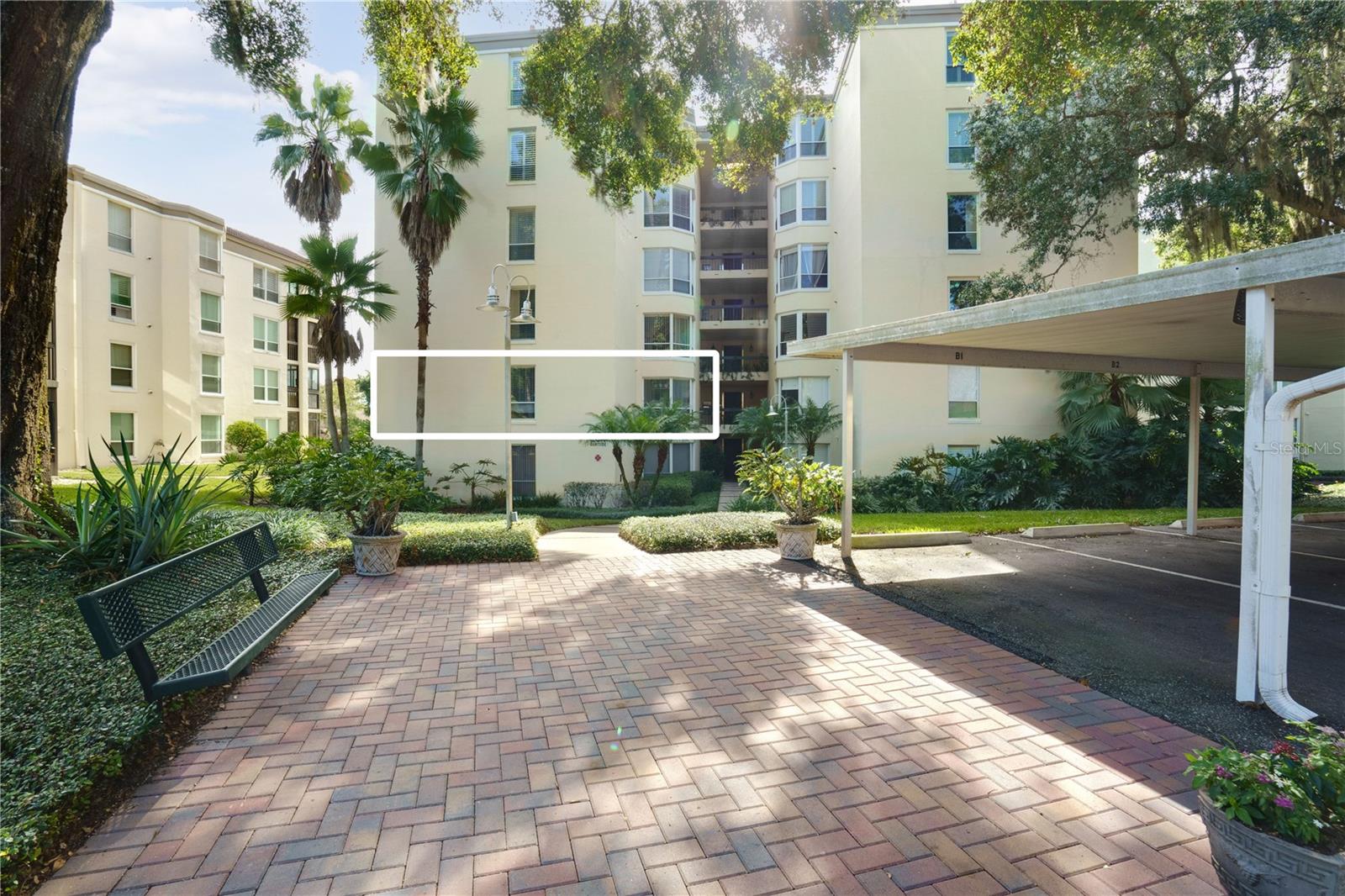 Front Exterior with Location of Unit - 204 QUAYSIDE CIR #201, MAITLAND