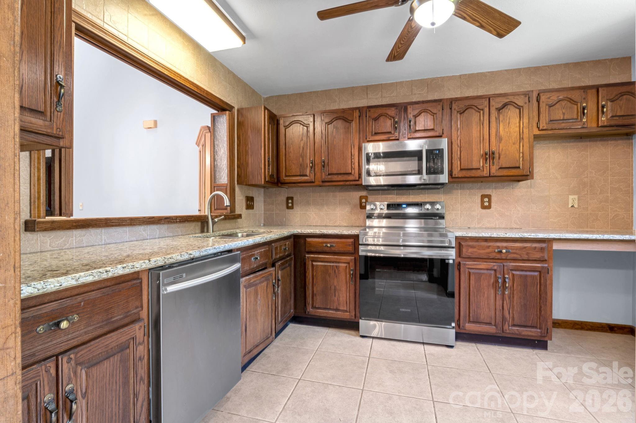 ample cabinetry, and functional layout. - 3104 Cove Loop Road, Hendersonville