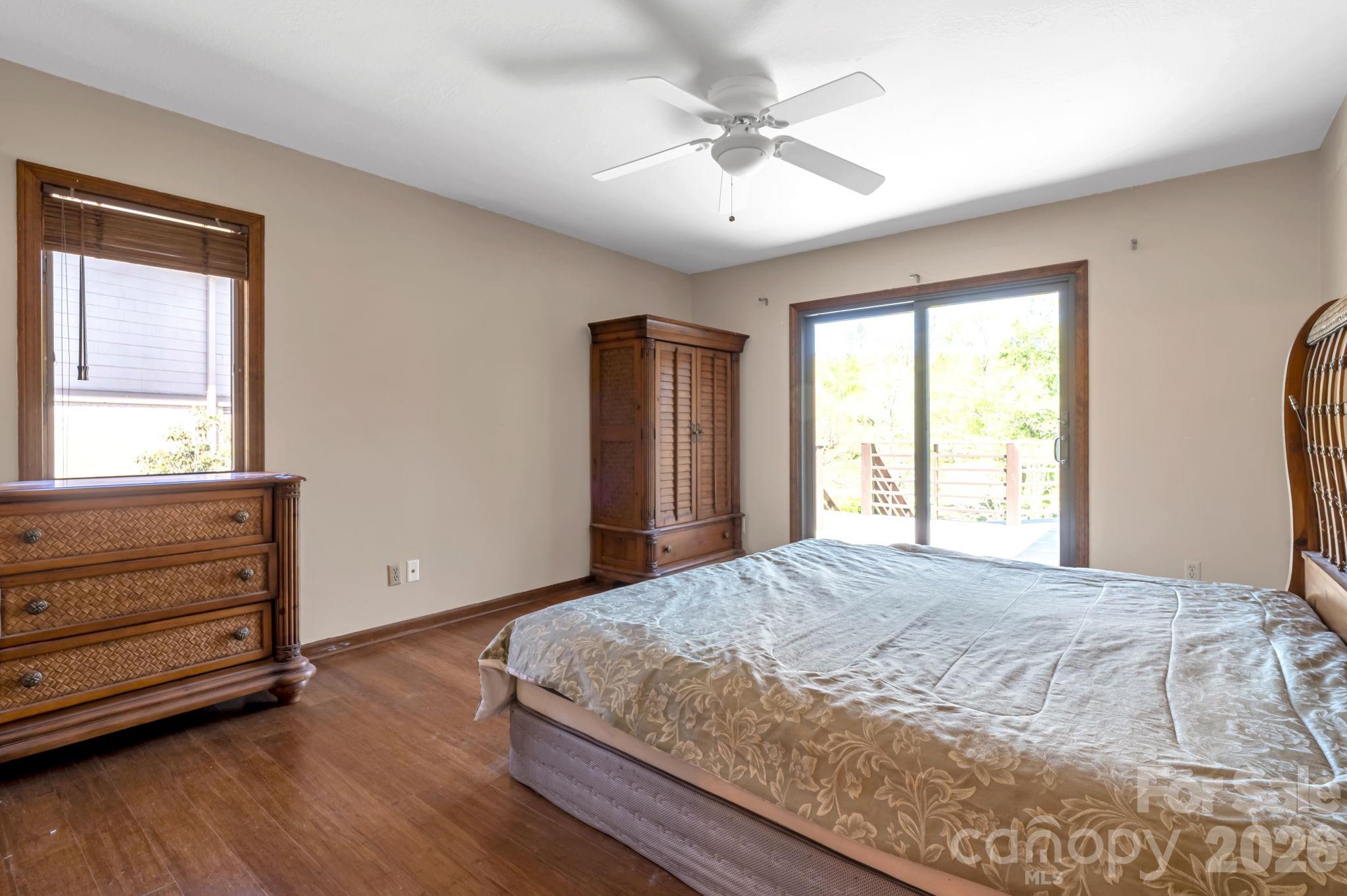 bedroom with generous space, natural light, and comfortable layout. - 3104 Cove Loop Road, Hendersonville