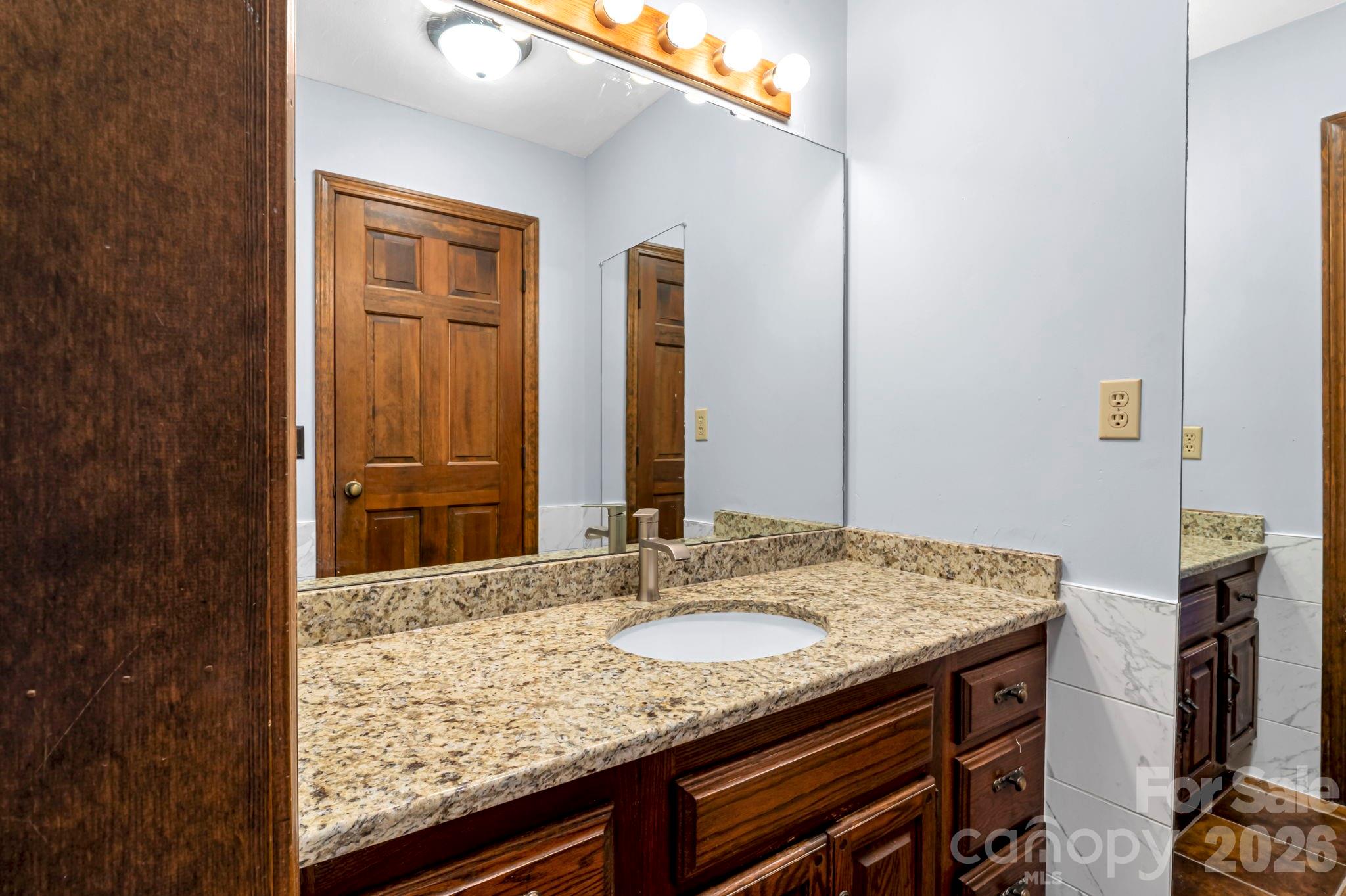 Full bathroom featuring clean finishes and functional layout - 3104 Cove Loop Road, Hendersonville