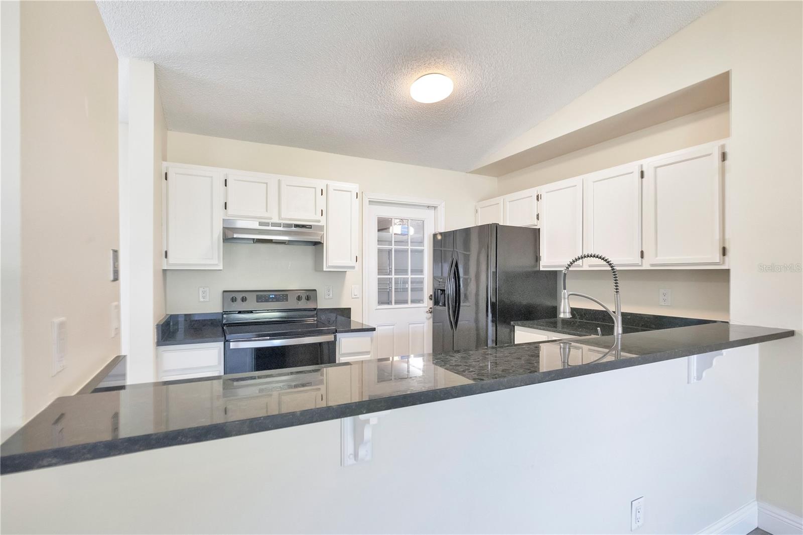 Kitchen with Breakfast Bar - 370 N LAKE AVE, APOPKA
