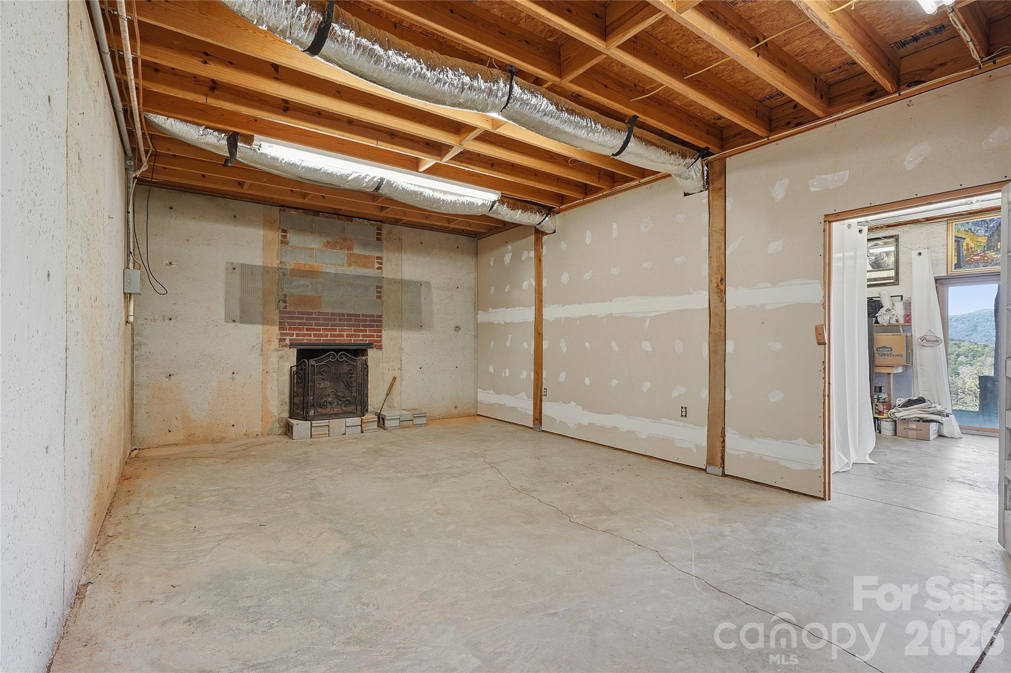 Basement Area w/Fireplace - 723 N Highland Road, Mill Spring