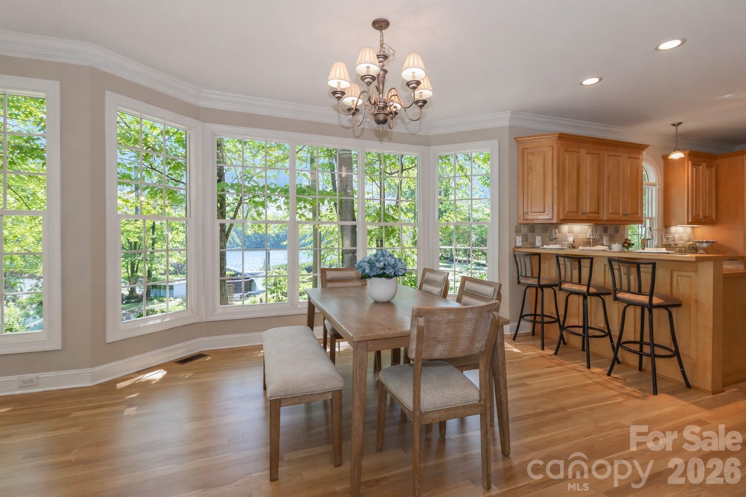 Beautiful views of the lake from the kitchen and casual dining area. - 119 Shelter Cove Lane, Mooresville