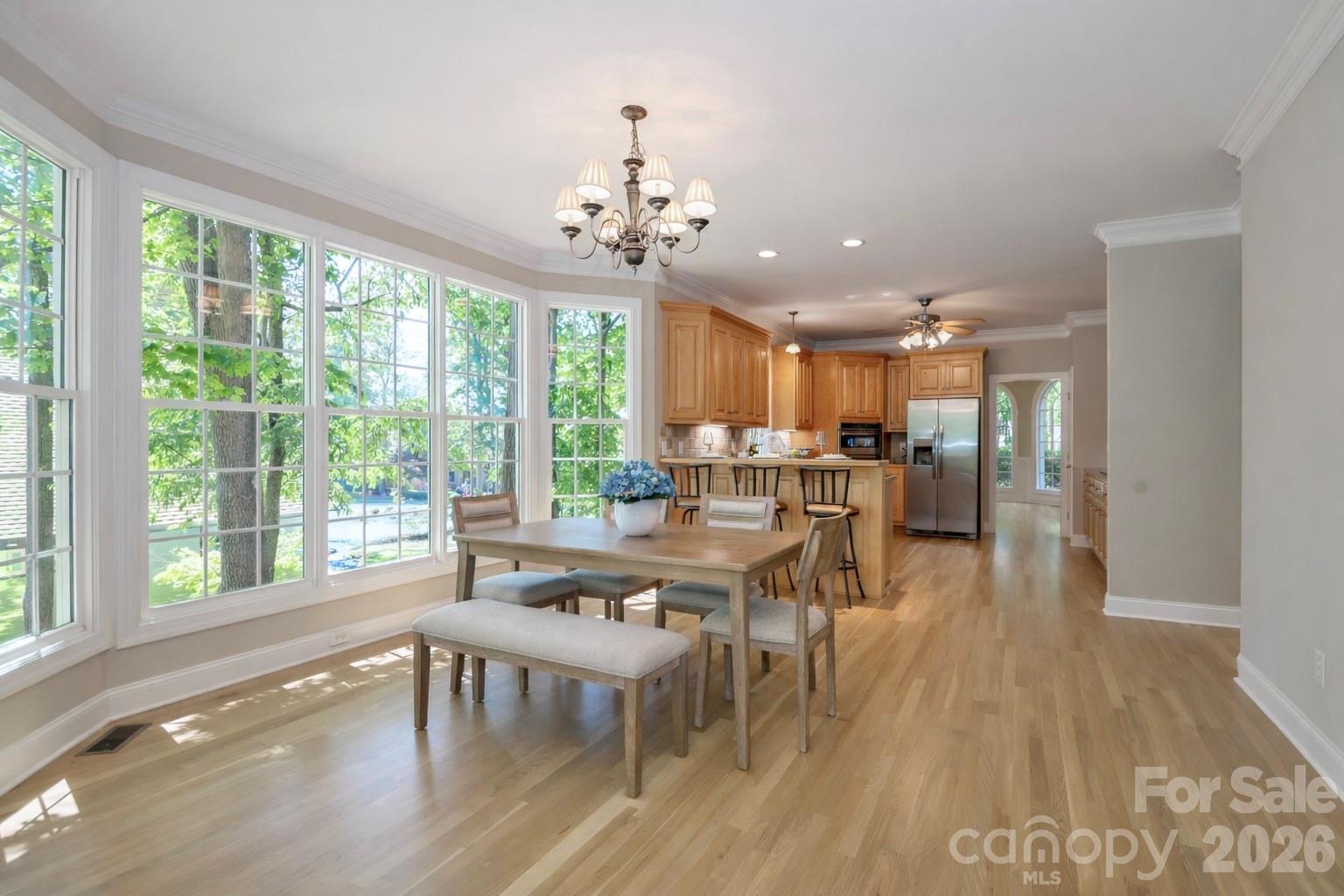 Spacious kitchen with dining area & views of the lake - 119 Shelter Cove Lane, Mooresville