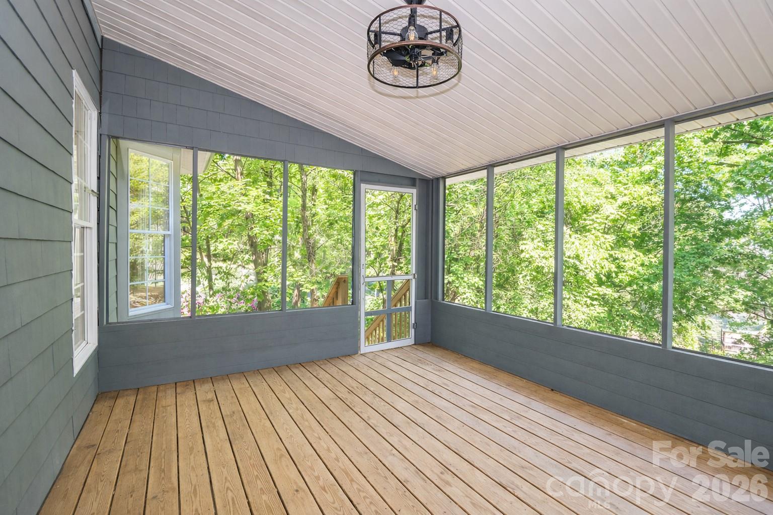 Screened porch off of the family room - 119 Shelter Cove Lane, Mooresville