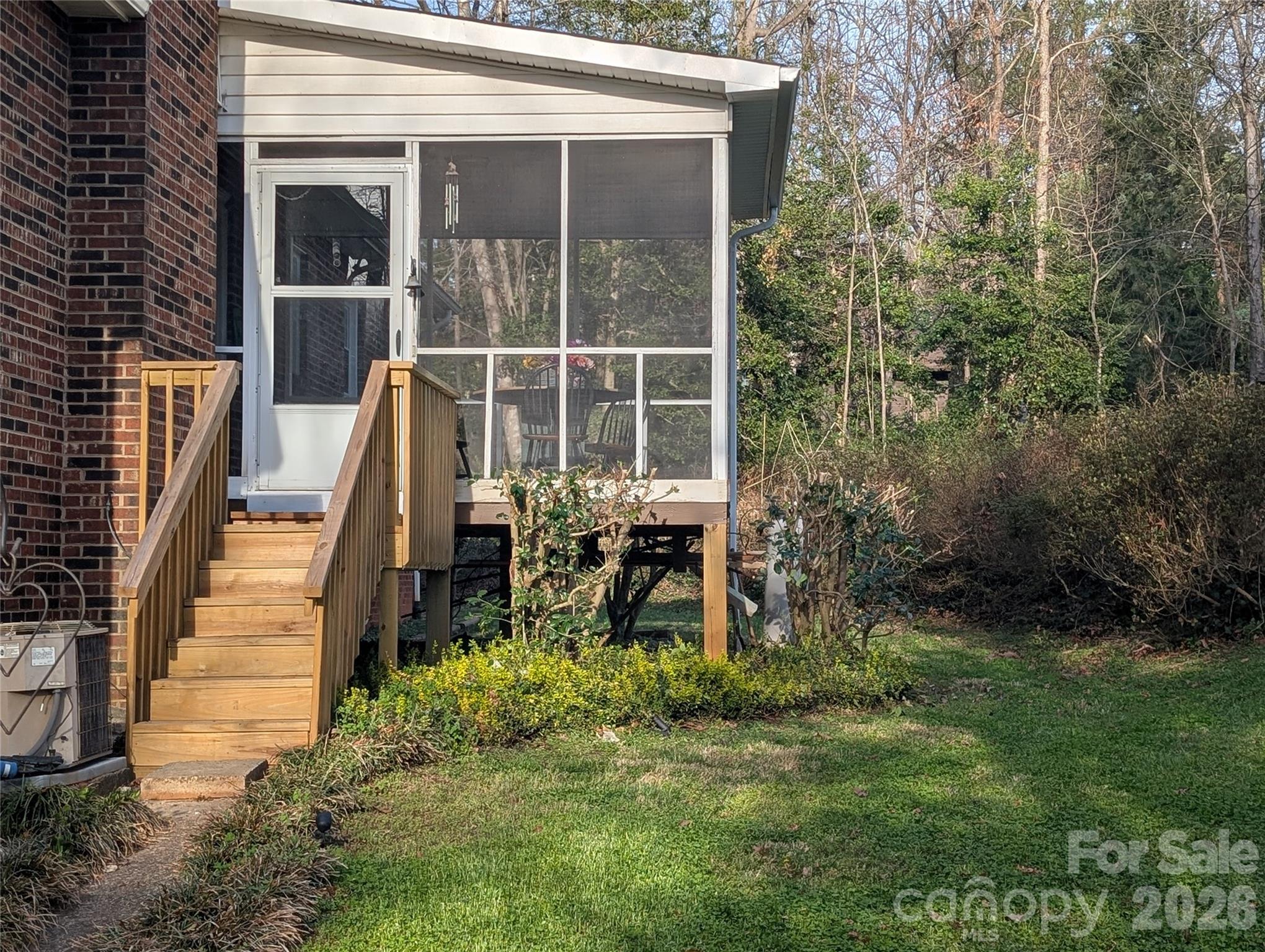 back screened porch with new landing and stairs. - 3065 Woodstream Drive, Valdese