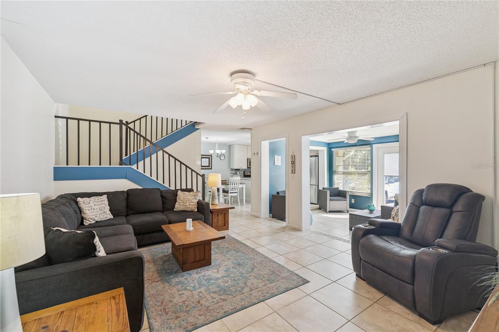 Living Room with view to the Kitchen/Sunroom - 4150 S ATLANTIC AVE #121B, NEW SMYRNA BEACH