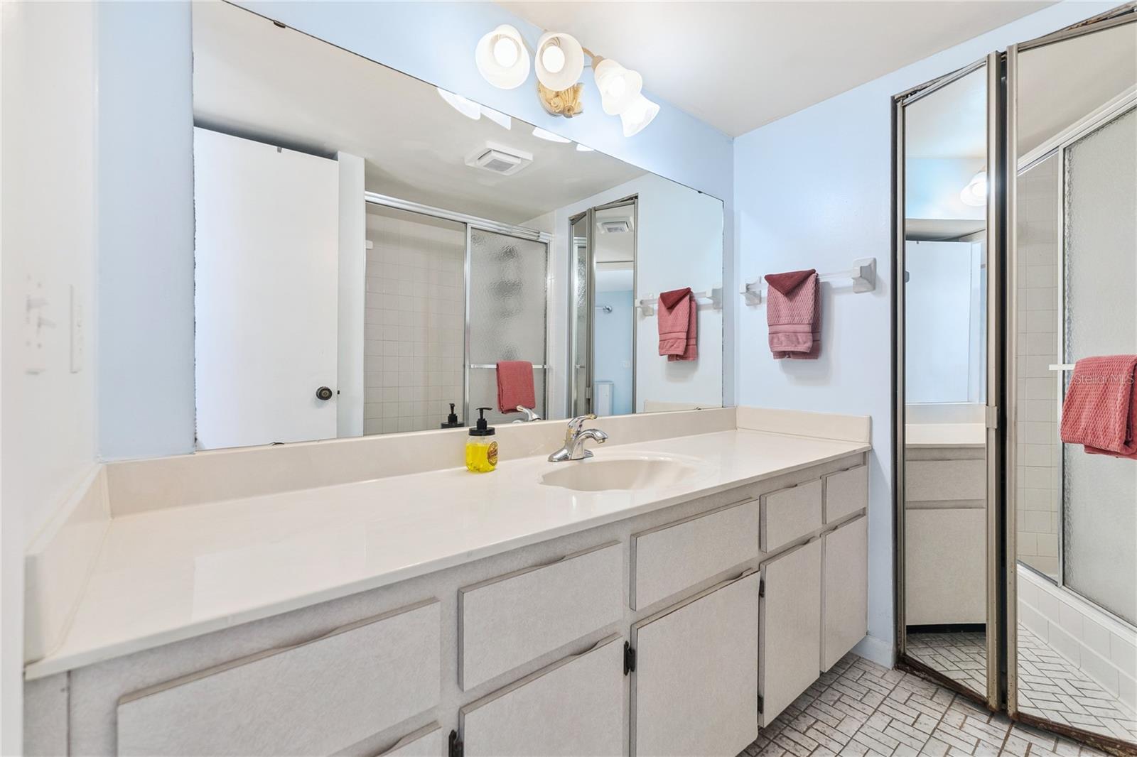Primary Bathroom with Walk-In Shower - 4150 S ATLANTIC AVE #121B, NEW SMYRNA BEACH