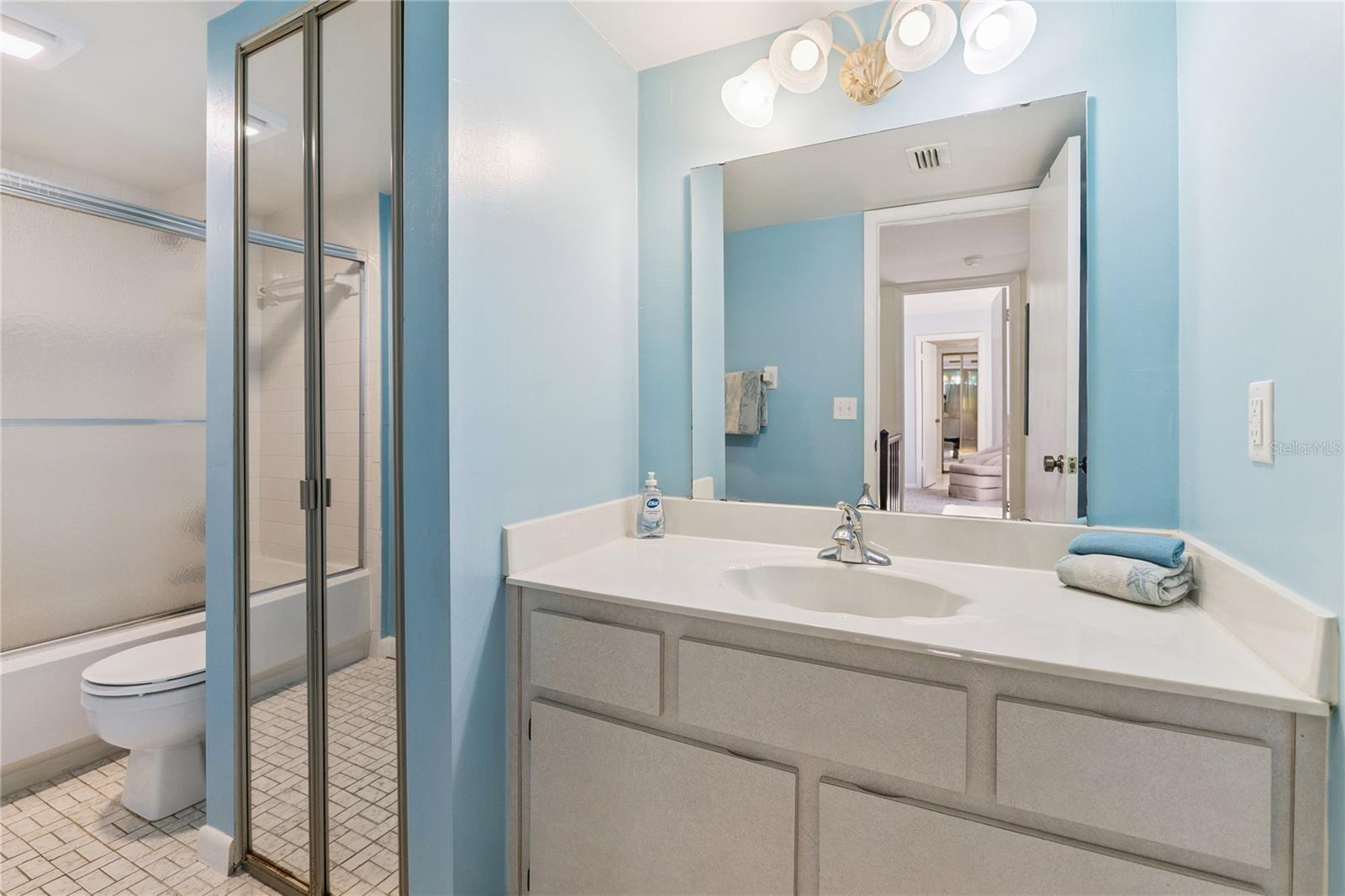 Second Bathroom serves Second Bedroom on 2nd Floor with Enclosed Shower/Tub Combo - 4150 S ATLANTIC AVE #121B, NEW SMYRNA BEACH