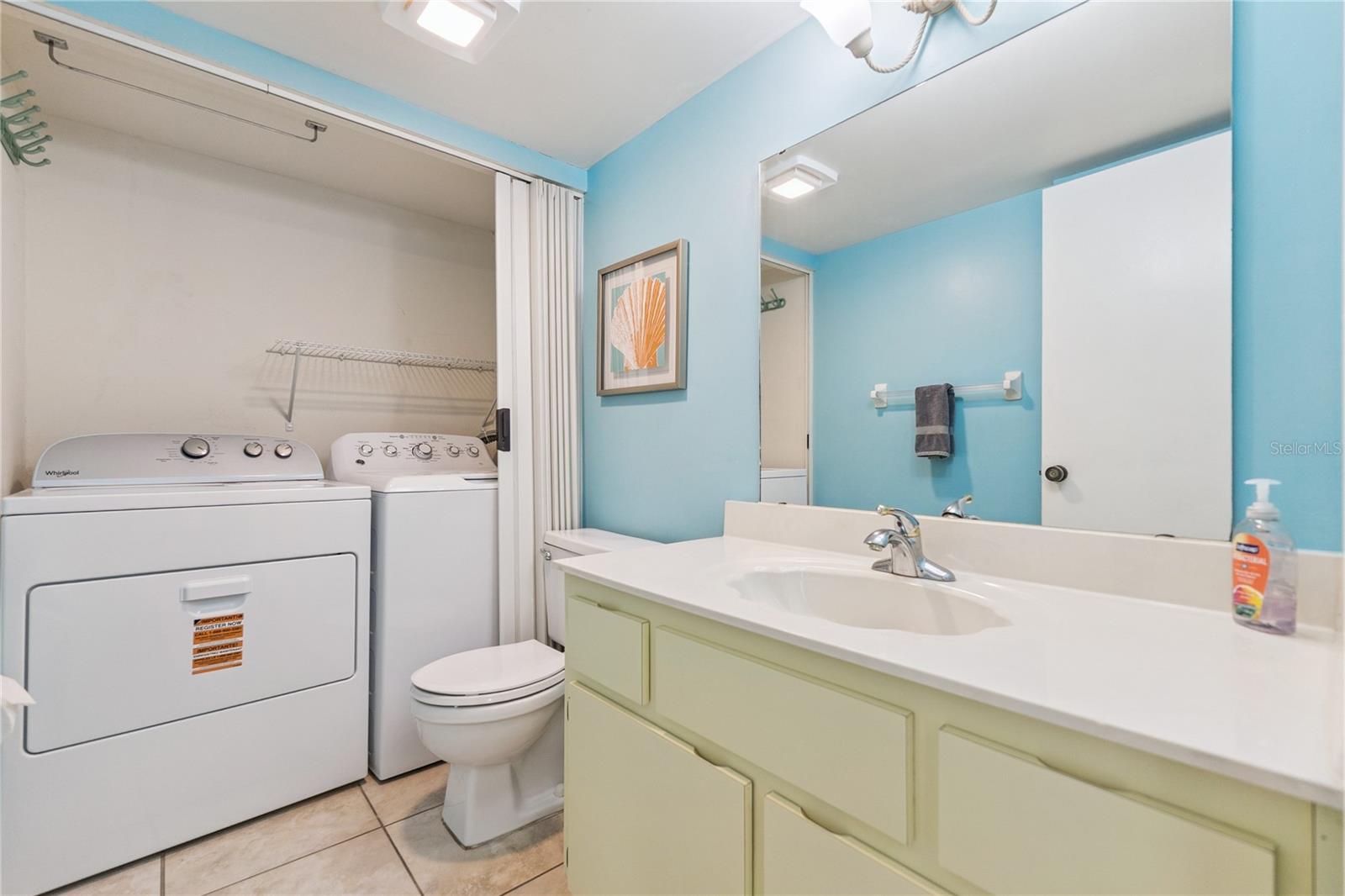 Half Bathroom/Laundry Room on First Floor - 4150 S ATLANTIC AVE #121B, NEW SMYRNA BEACH