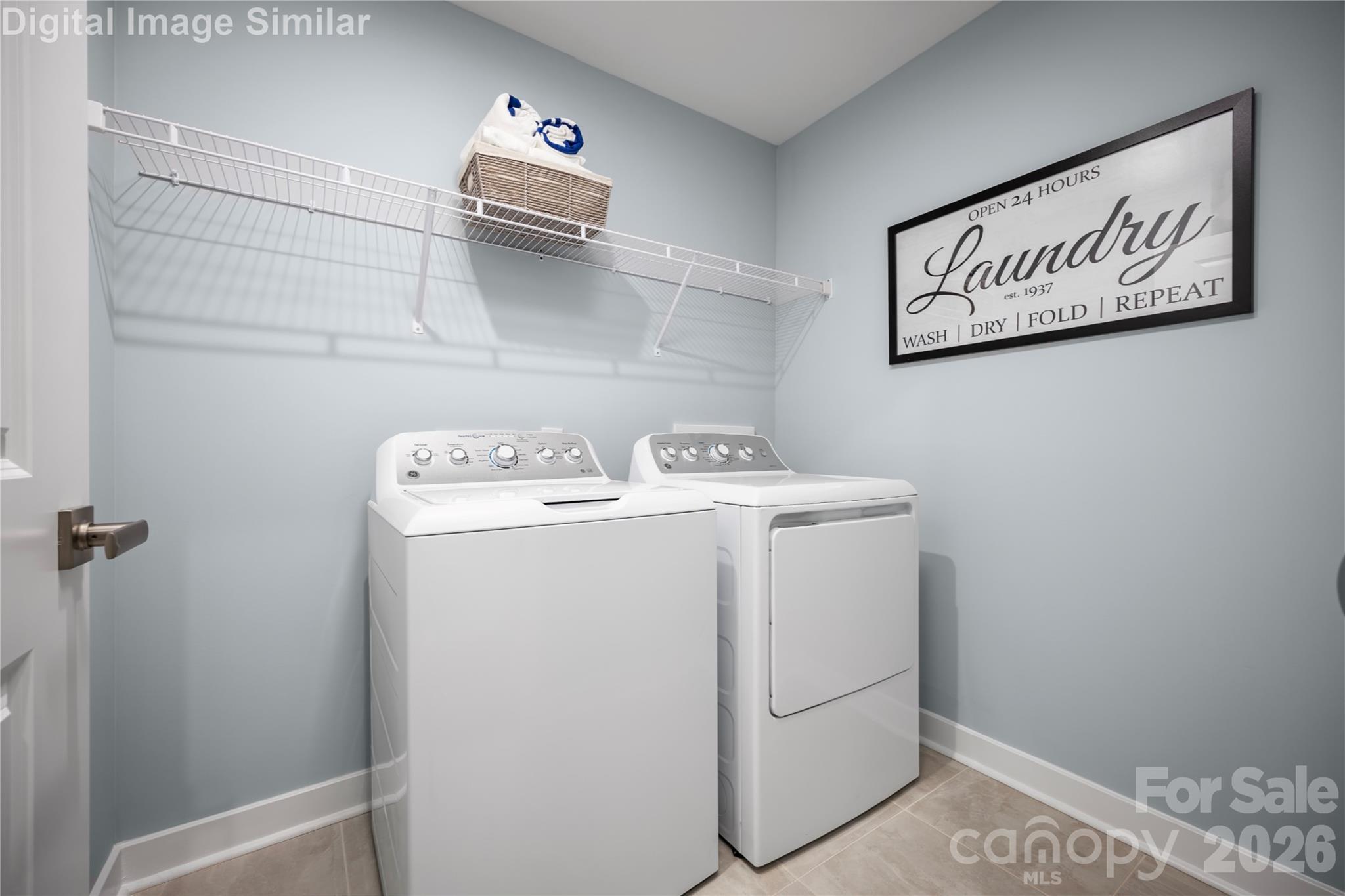 Laundry Room You'll Love.  Whether You're Sorting, Folding, or Tackling a Mountain of Towels, the Layout is Built for Efficiency. - 3271 Eller Drive Extension, Hickory