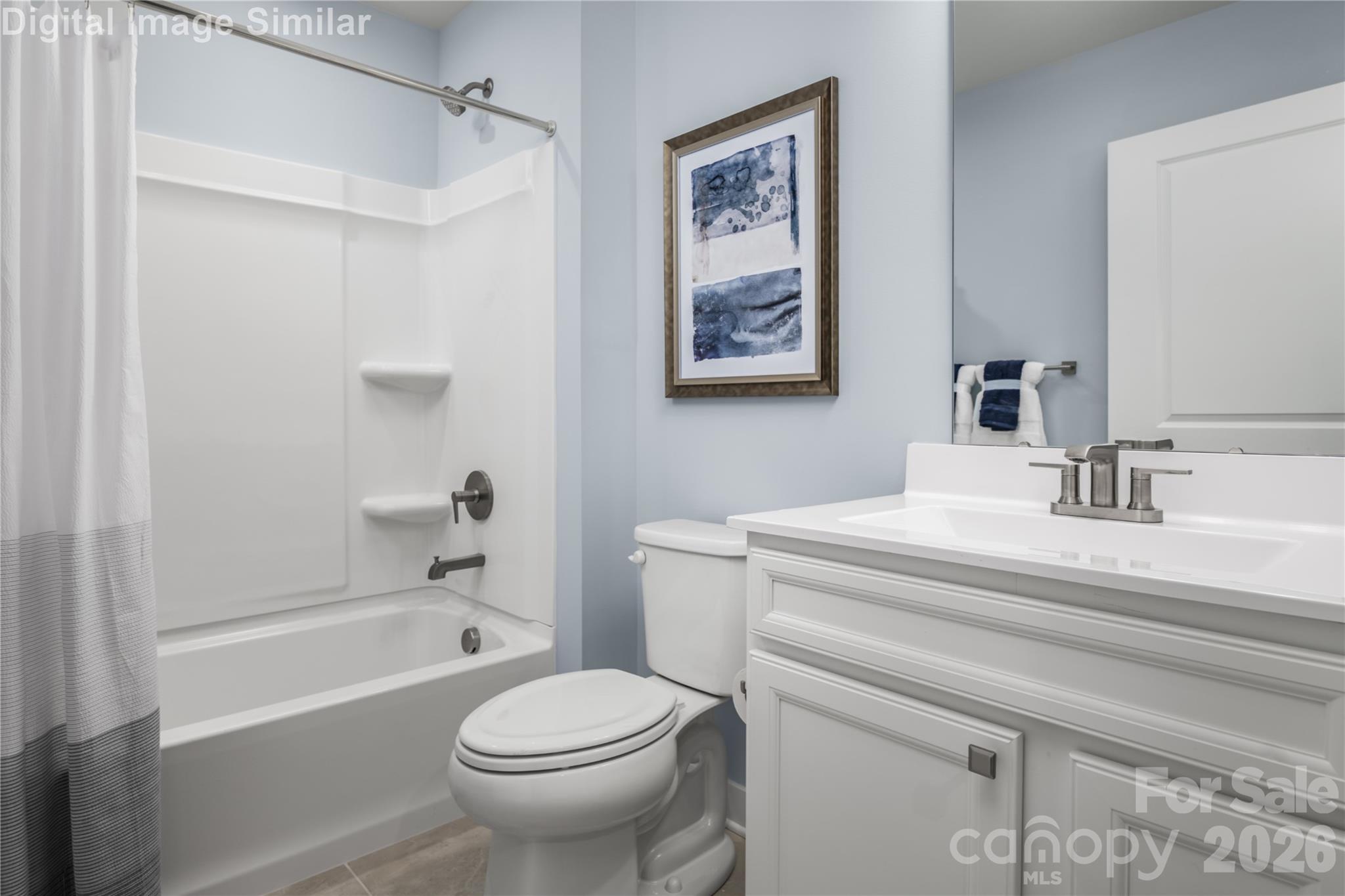Bright, inviting shared bathroom with a tub perfect for winding down. - 3291 Eller Drive Extension, Hickory