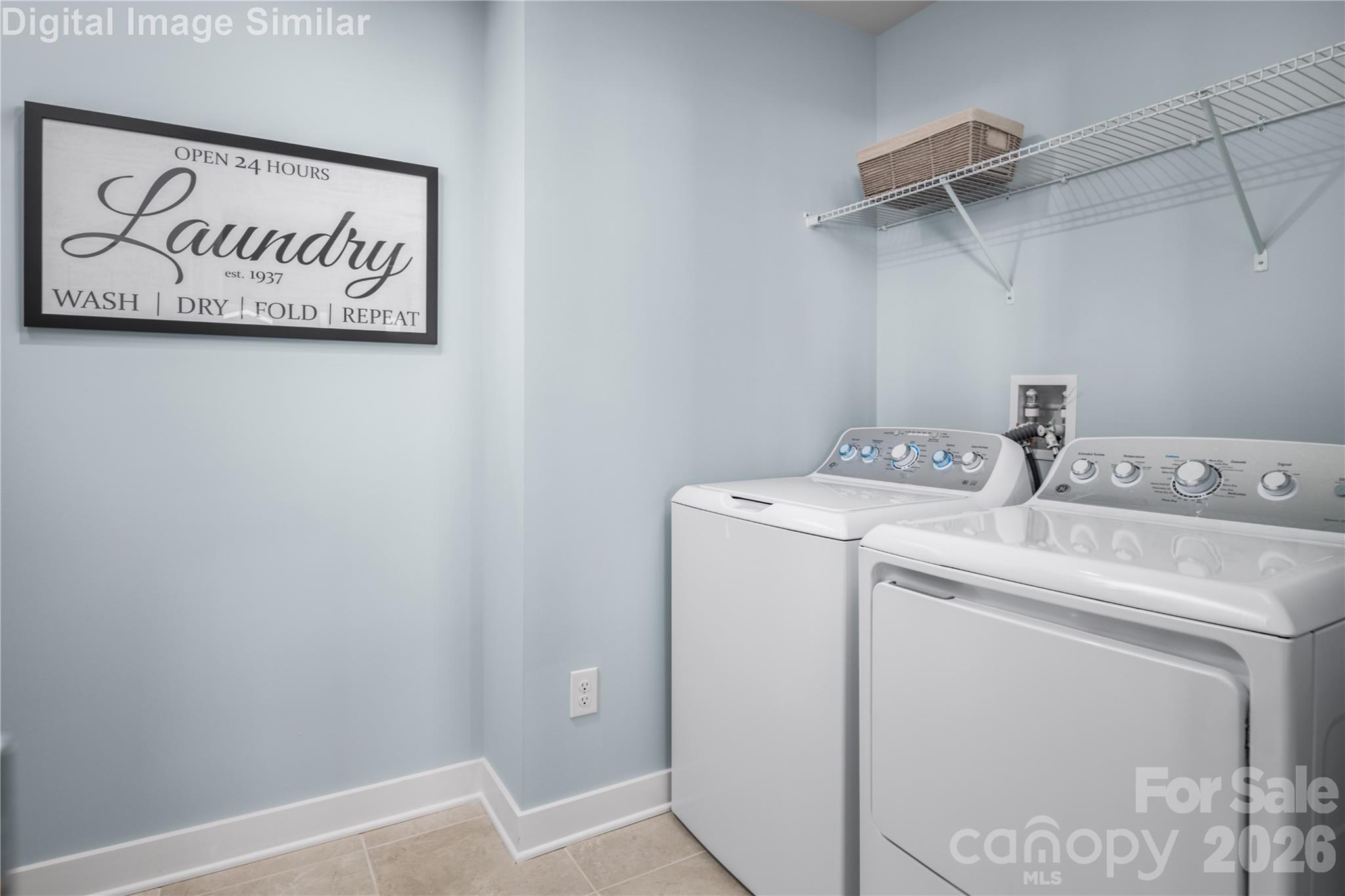 Main-level laundry - convenient to the primary bedroom. Washer and Dryer optional. - 3291 Eller Drive Extension, Hickory