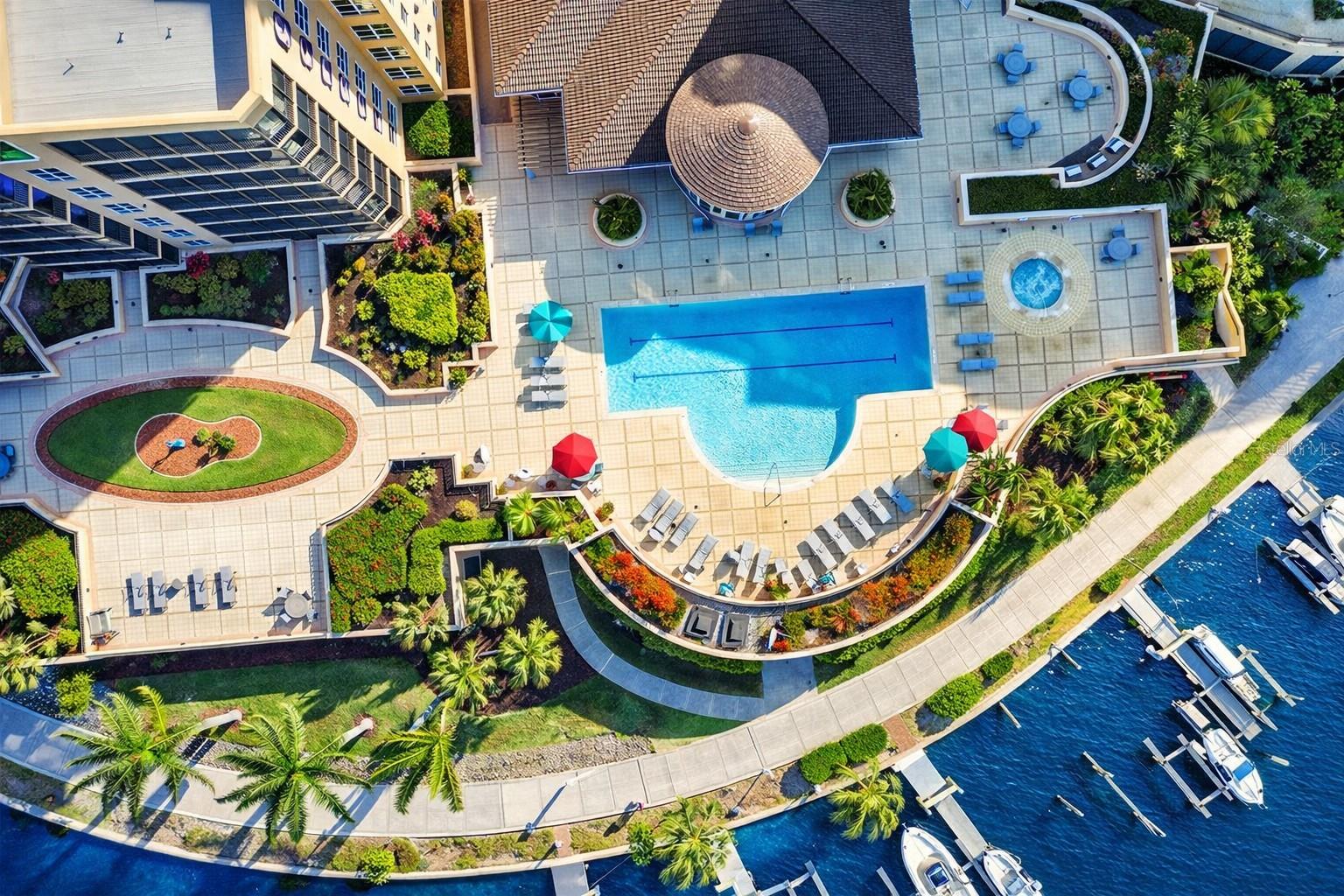 GI I & II amenities level overlooks the Prosperity point docks and walking path. Beauty abounds! - 3321 SUNSET KEY CIR #502, PUNTA GORDA