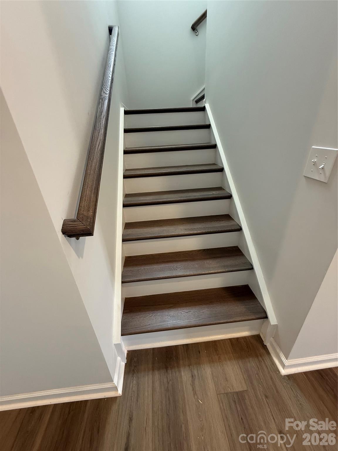 Stained Split staircase - 1641 Piper Creek Avenue, Newton