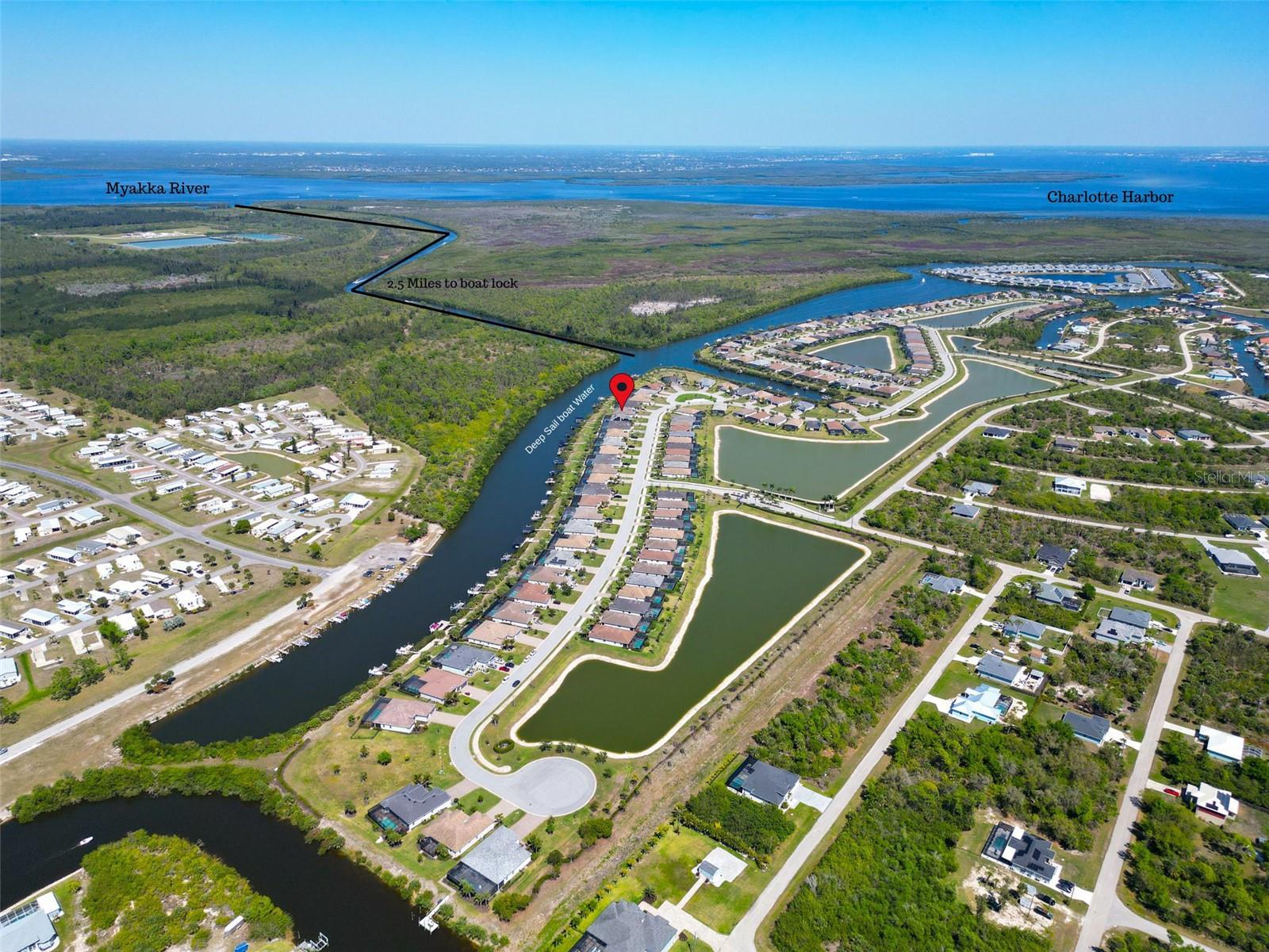 Picture with the entire community and canal to Charlotte Harbor within view. - 14500 PONCE DE LEON TRL, PORT CHARLOTTE
