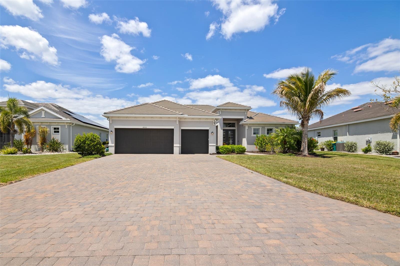 Front Exposure of the home from the dirveway. - 14500 PONCE DE LEON TRL, PORT CHARLOTTE